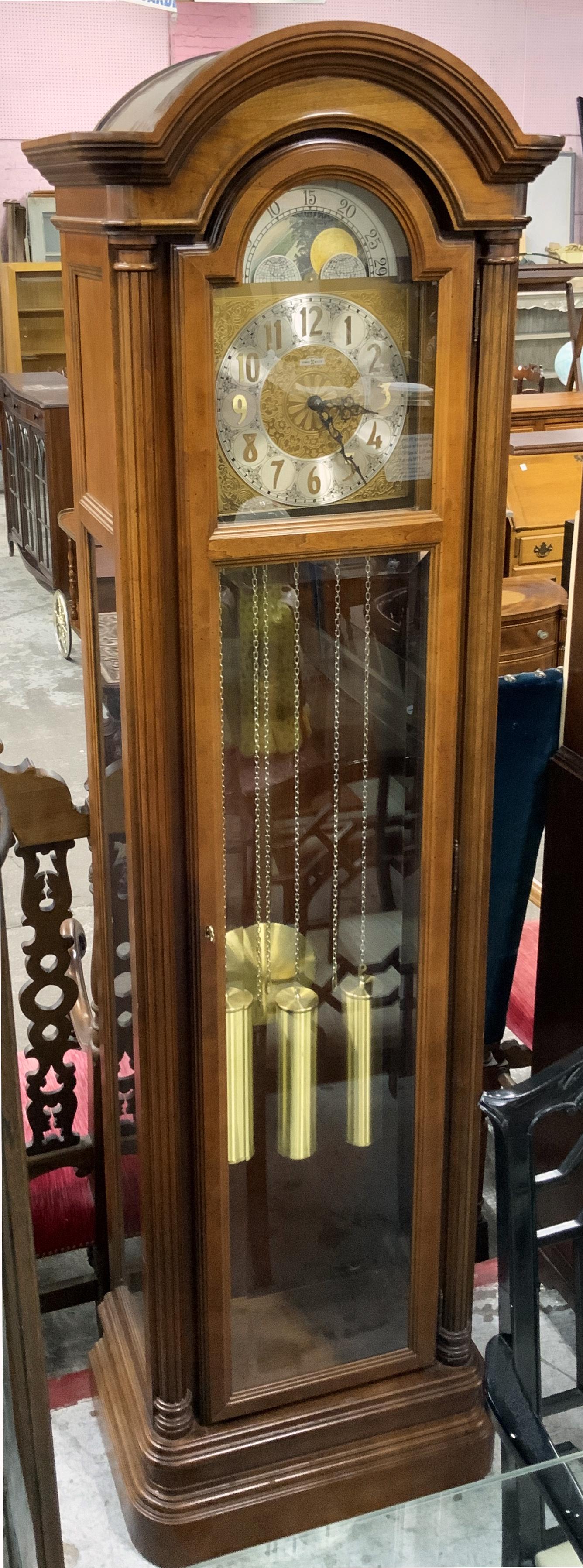 Howard Miller Triple-Chime Grandfather Clock.: Model 610-152. Has a #180 Weight-Driven Triple-Chime Movement. It is Running Well. Measures 19 1/2" Wide and 80" HIgh. Third-Party Freight Shipping or Personal Pickup Required.