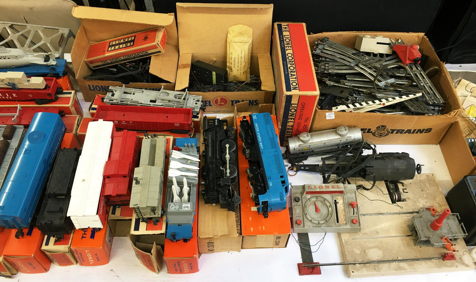 Large Lot of Lionel Trains, Track, Etc.: Many of the Cars Have the Original Boxes. Includes: #224 Engine, #2018 Engine, and the Following Cars: #6544, #6419, #6257, #6448, #6026W (Tender), #224C, #3562, #6464-400, #6820, #3665 (Missile has b