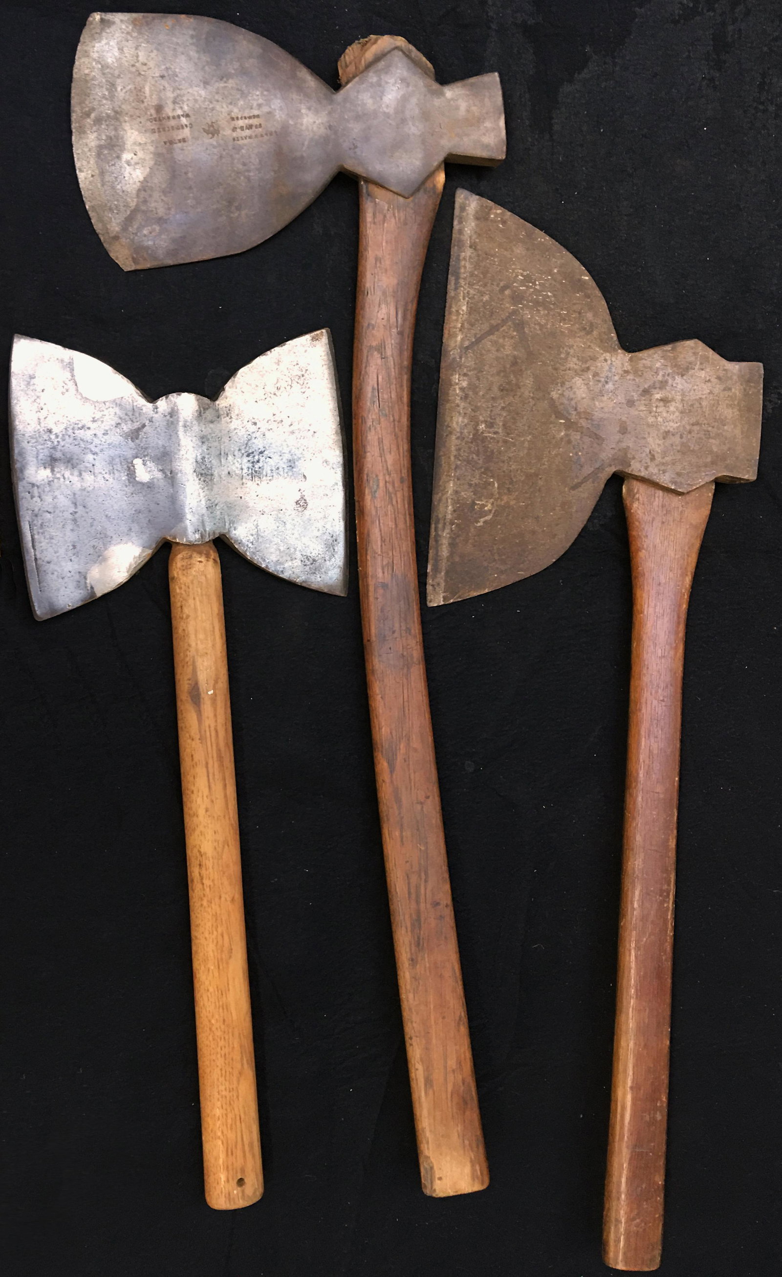 Lot of Three Very Old Axes.: A Double-Edged Axe (Unsigned, Blade Measures 9" Wide and 7 1/8" Long), an Unmarked Axe (Blade Measures 11 3/4" Long and 9 1/8" Wide), and an Axe Signed "L.H. & W.H. Watts, 96 Ave. New York". (Blade Me