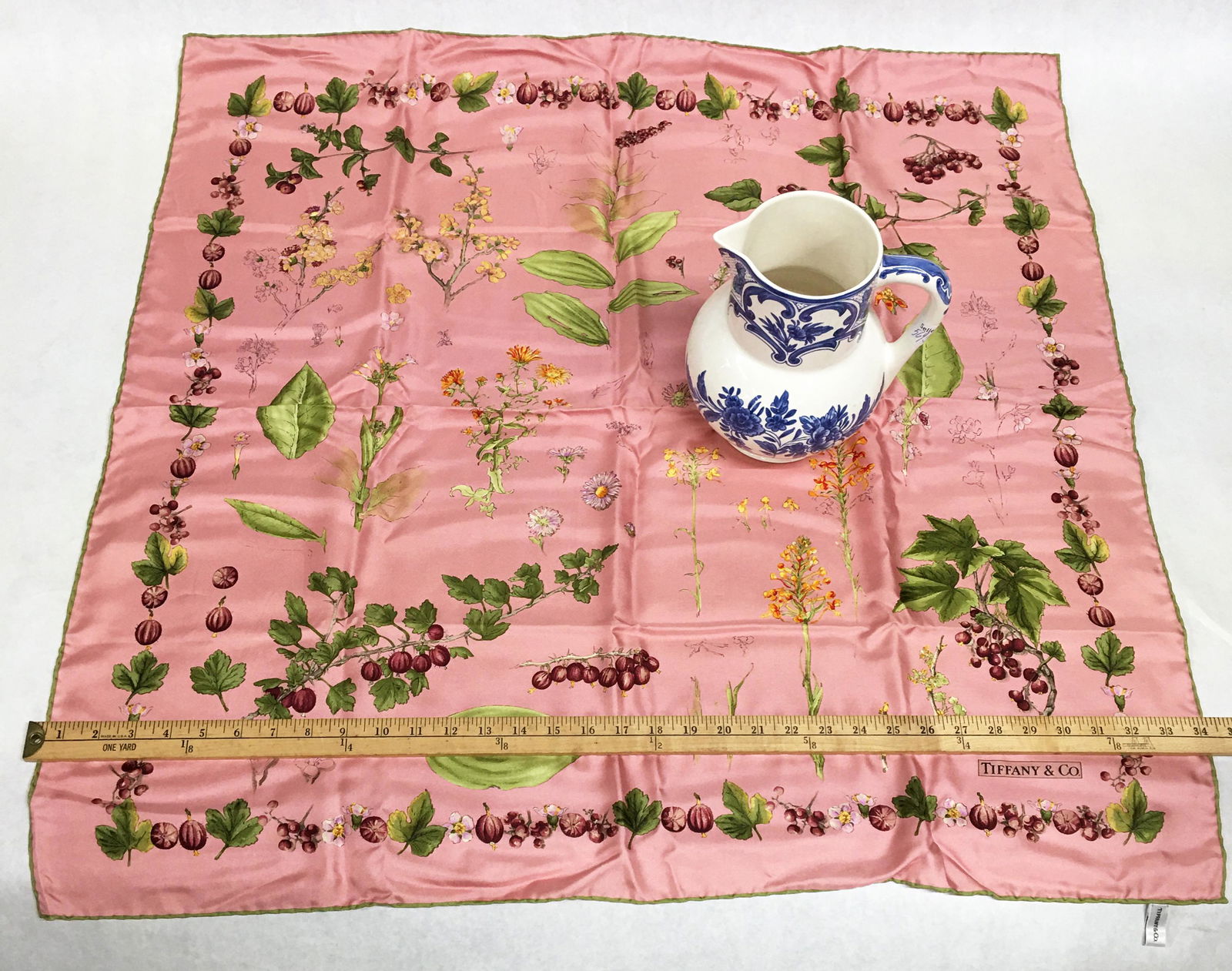 Lot: Tiffany Delft Pitcher & Tiffany Silk Scarf.: The Scarf Comes in the Original Tiffany Blue Box. The Pitcher Measures 8 1/4" Tall. The Scarf Measures 32" Square, and does not have any Snags. It Probably was never Taken out of the Box until we Meas