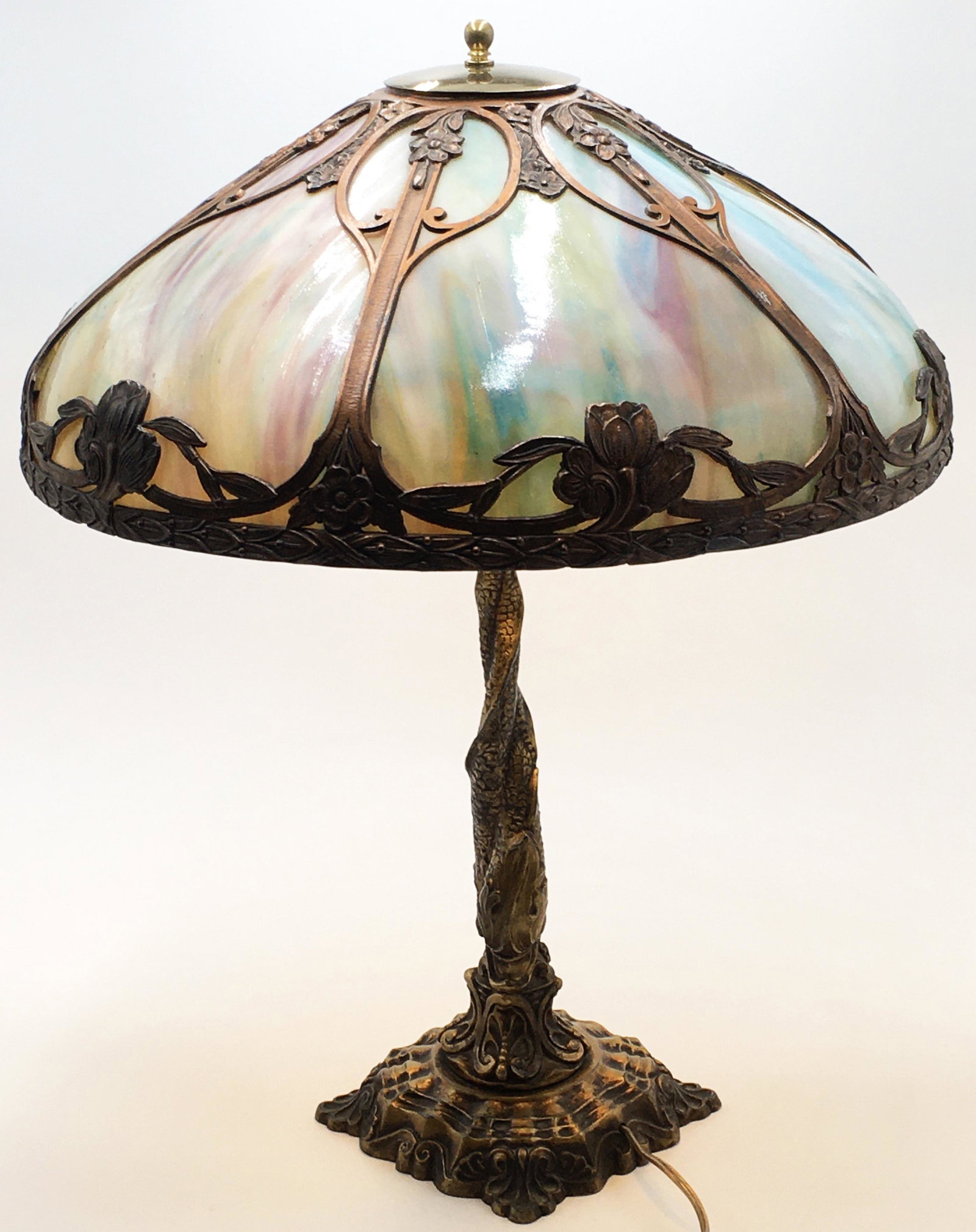 Sgd. W.A. Best Antique Slag Glass Table Lamp.: A Panel Glass Lamp. All Slag Glass Looks Intact. One area of Metal (Around the Rim of the Shade) is Broken. Also, the Cap and Finial are not Original, and do not Match the Lamp Very Well. Measures 22"