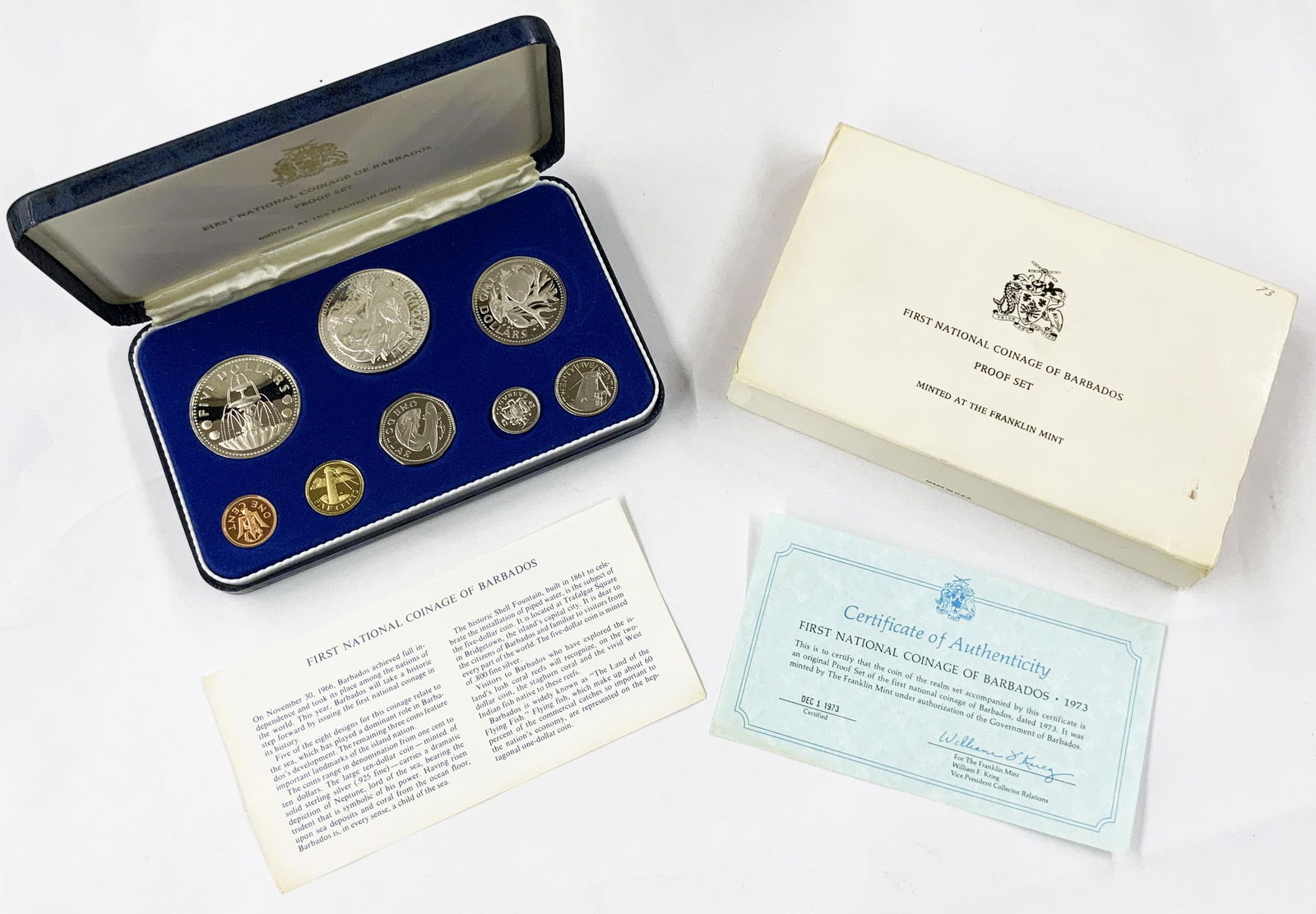 1973 Barbados Proof Set - Some Silver.: This Set, Minted by the Franklin Mint, has a $10 Sterling Silver Coin, and a $5 .800 Silver Coin. The Set has the Original Box, Papers, and Sleeve. The Sleeve has Some Wear and Creases in it, as well