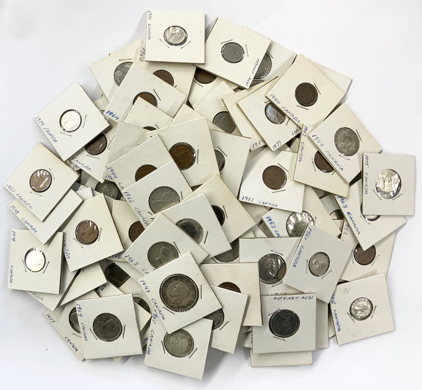 Collection of Canadian Coins - Some Silver.: Includes: Some Silver Quarters, Some Silver Dimes, and a Silver Half Dollar.