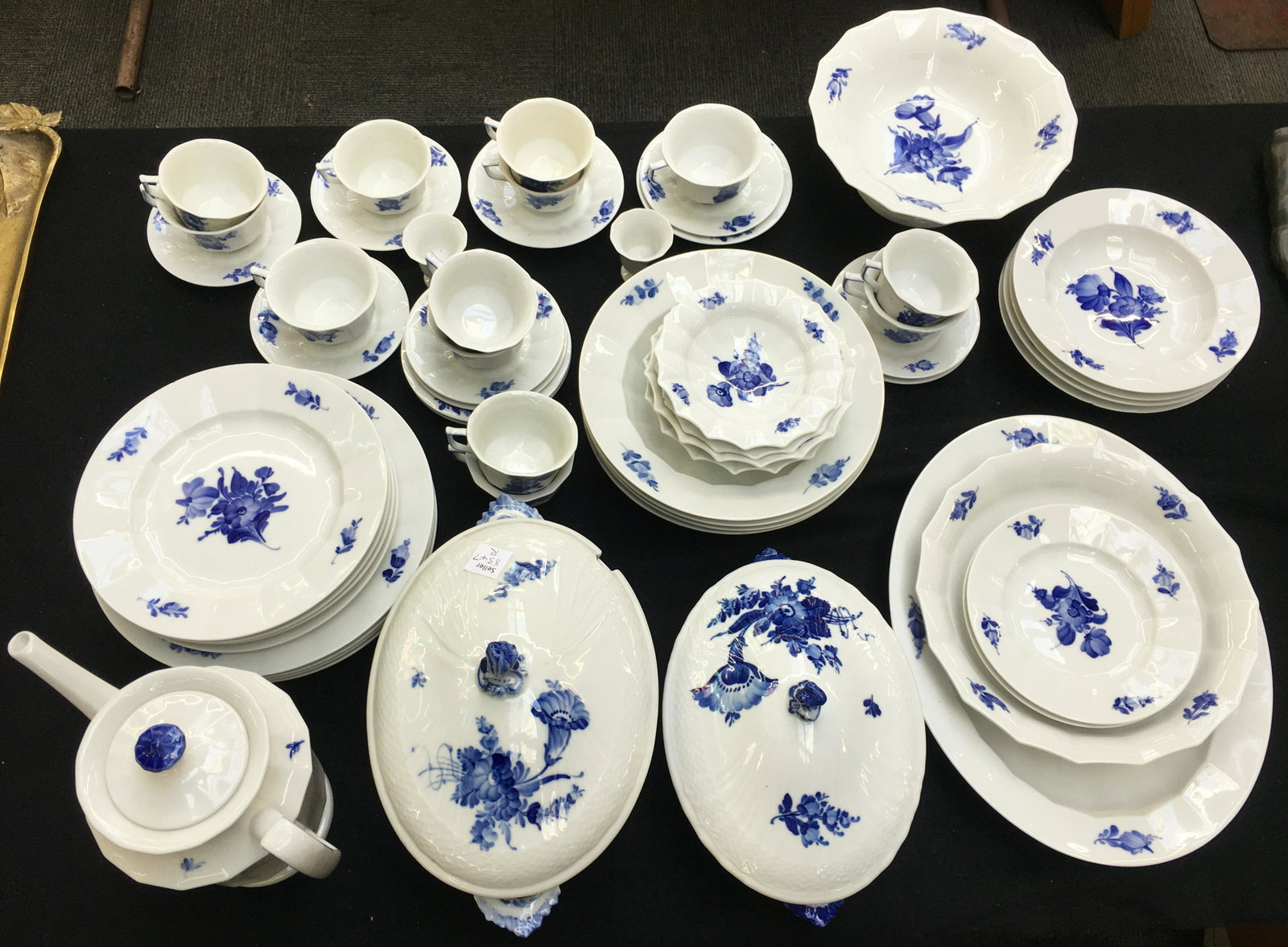 Lg. Set of Royal Copenhagen "Blue Flower" China.: Blue and White, with a Floral Pattern. Consists of a Serving Bowl, Serving Dish, a Covered Tureen, Covered Serving Dish, Coffee Pot, 4 Soup Bowls (2 are Chipped), 4 Salad Bowls (1 is Chipped), 4 Large