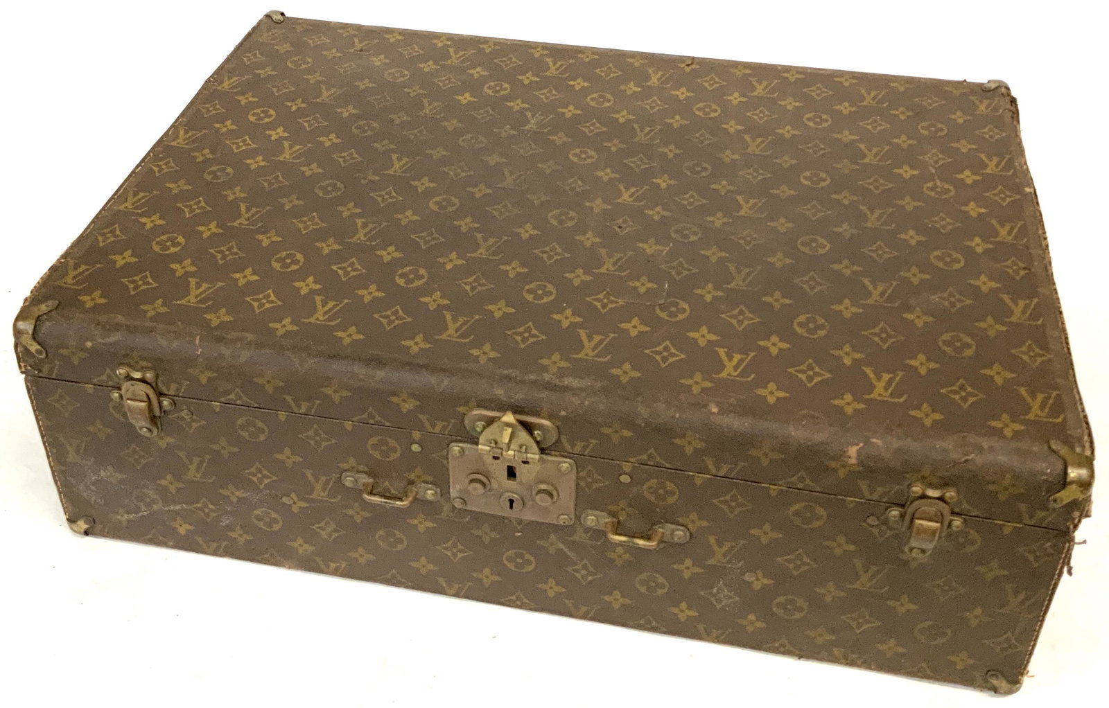 Vintage Louis Vuitton Suitcase, As Is.: The Suitcase is Torn, Rotted, and Falling Apart on the Bottom. Measures 16 1/2" High, 23 3/4" Wide, and 7" Deep. Third-Party Shipping Required.