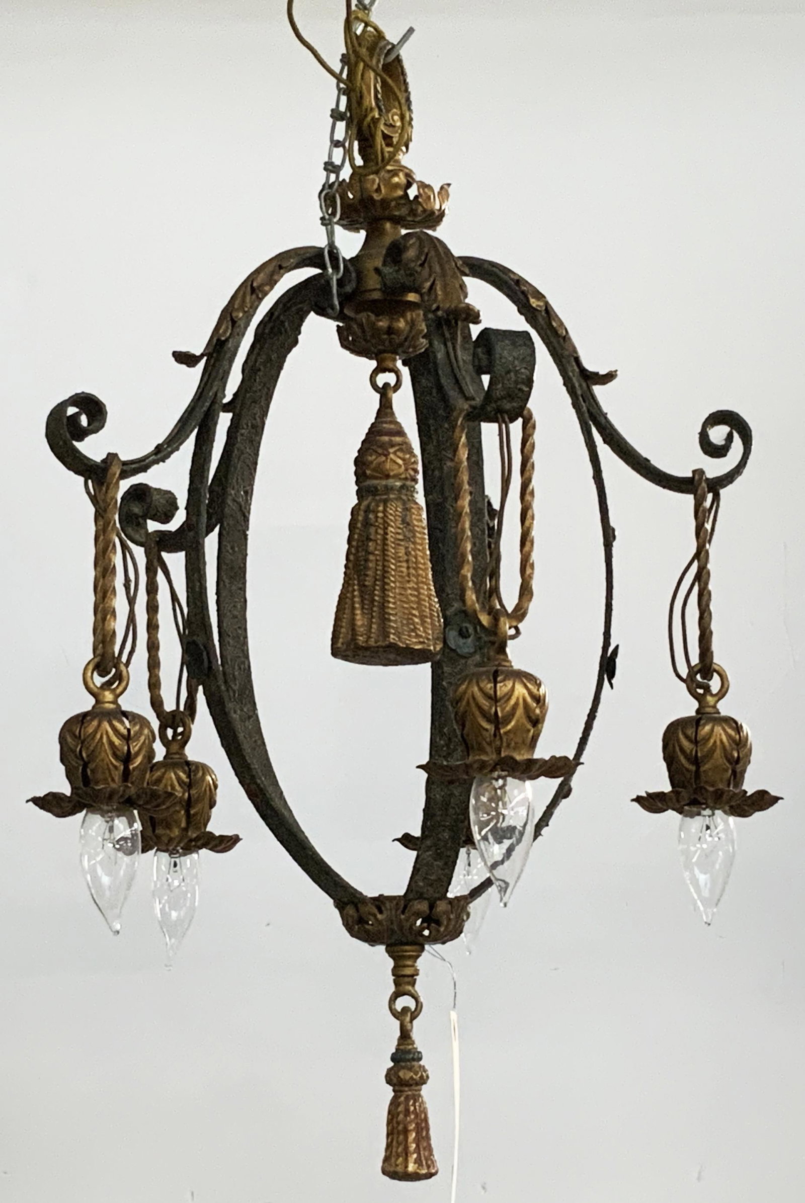 Antique Gothic Style 5-Light Chandelier.: Brass? & Wrought Iron. Measures 28" Long and 16" in Diameter. Third-Party Shipping or Personal Pickup Required.