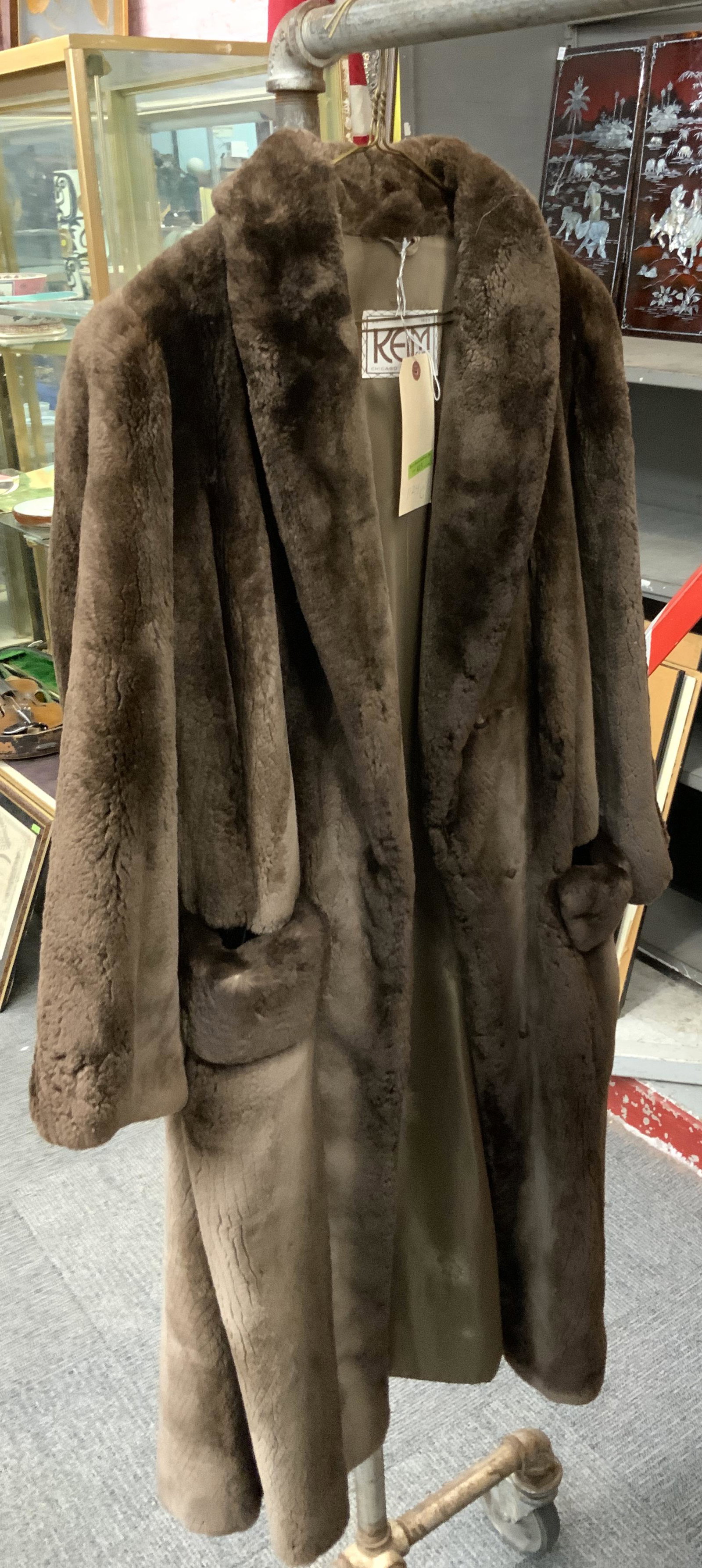 Brown Sheared Fur Ladies' Full Length Coat.: Measures 46" Long. By Keim Furs. Has a bit of Wear on the Top of the Pockets.
