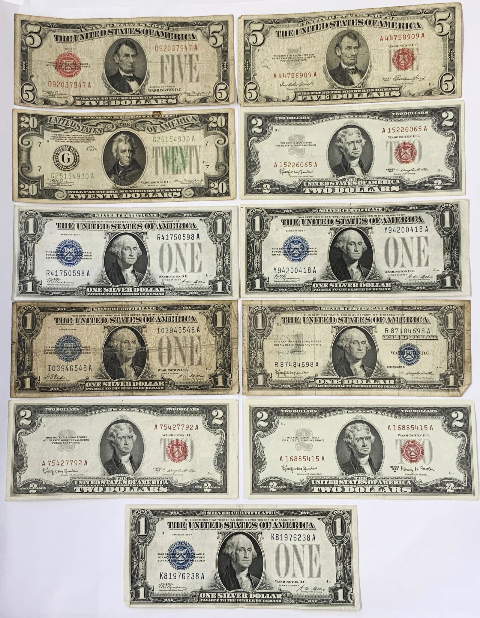 Lot of Asst. U.S. Currency Notes.: Includes: Three 1928-A $1 "Funnyback" Dollar Bills (Nice Condition), a 1928-B Red Seal $5 Note (Terrible Condition), 3 Crisp Red Seal $2 Notes (1963-A, 1963, and 1953-C), a 1953 Red-Seal Note (Bad Con