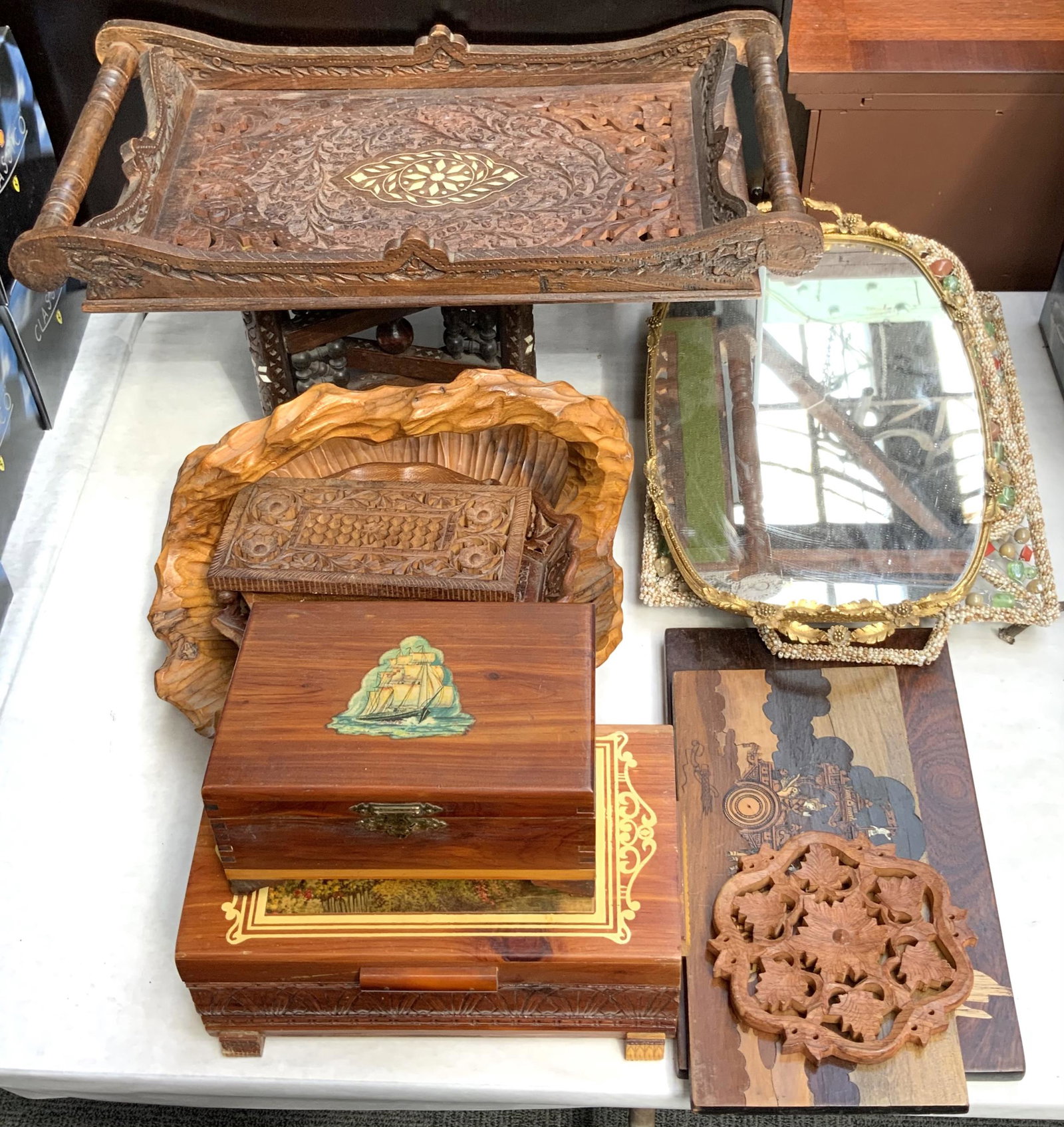 Lot: Vintage Carved Wood Trays, Baskets, etc.: The Indian-Style Carved Tray on Stand Measures 21" Wide. Third-Party Shipping Required.
