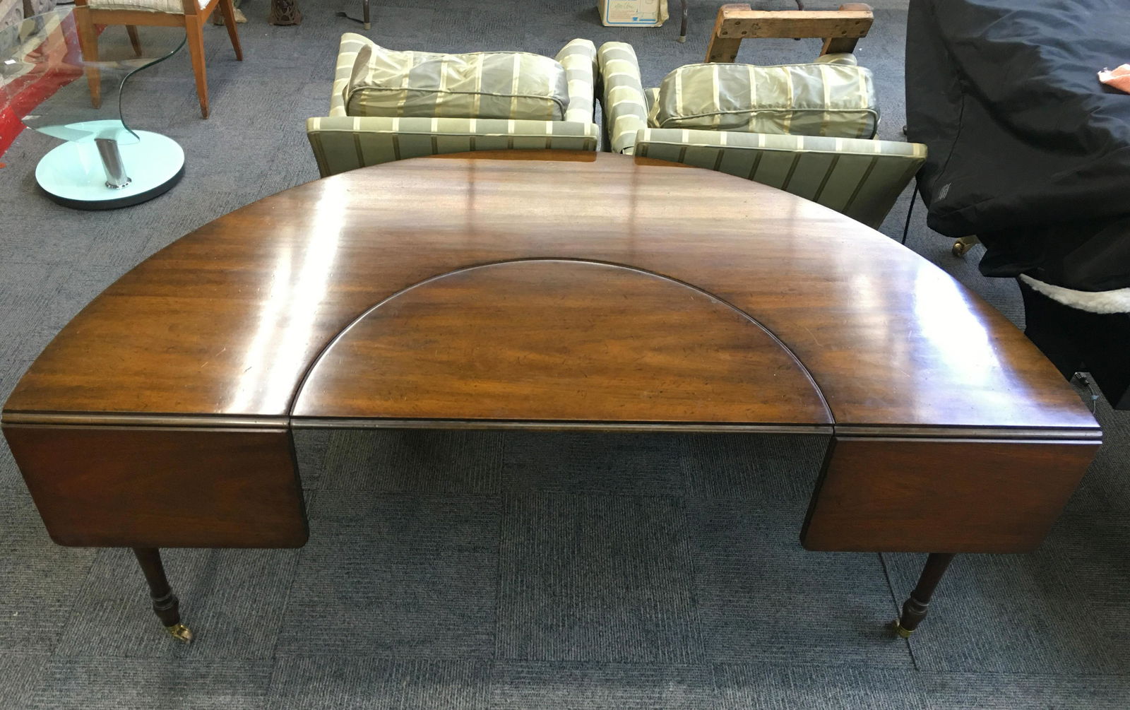 Kittinger 100th Anniversary Desk or Table.: With Drop Leaves and a Removable Center. Has some Scratches and Wear to the Finish. In Overall Fair to Good Condition. Measures 69" Wide and 35" from Front to Back. Third-Party Freight Shipping or Per