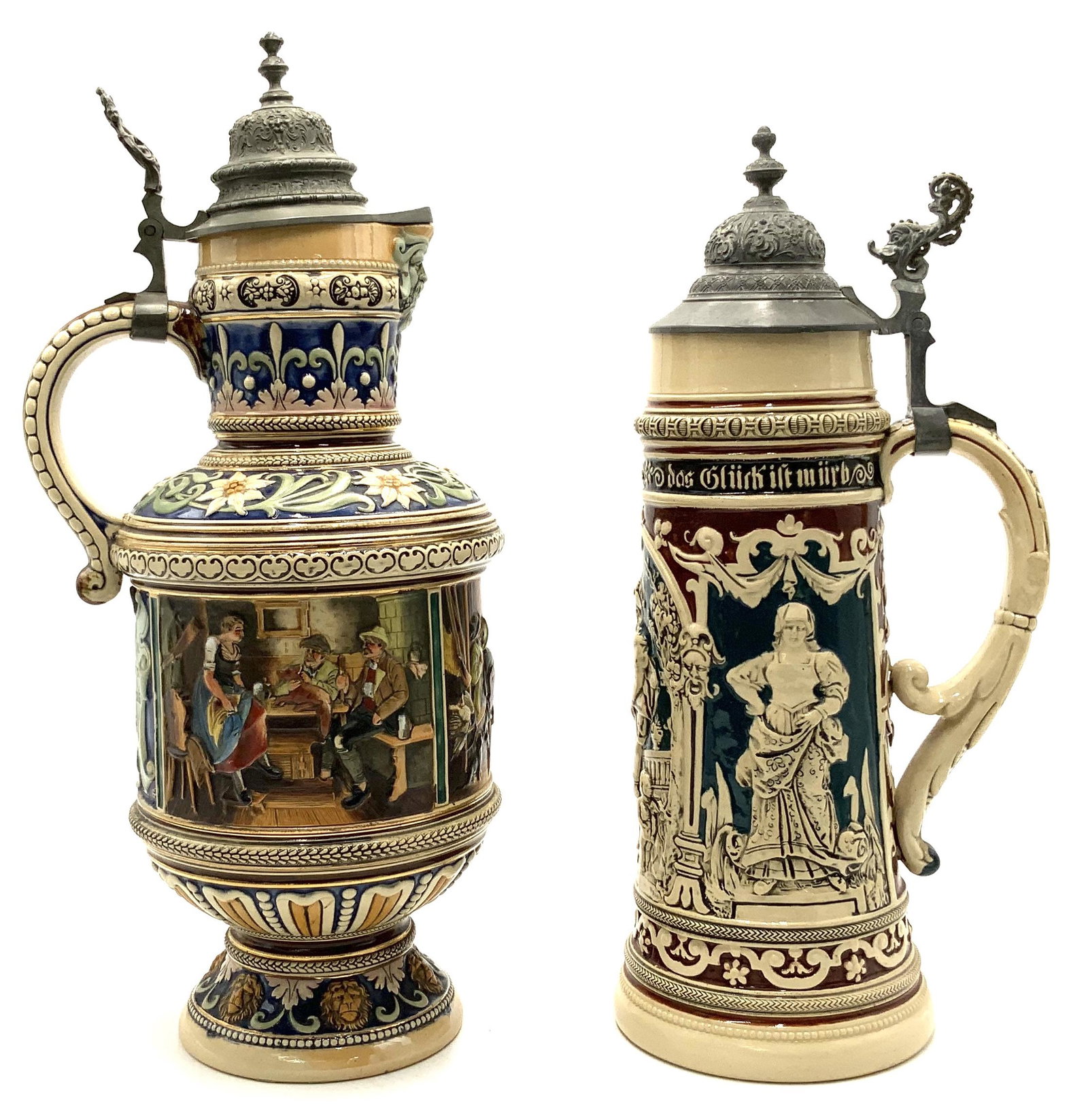Lot of 2 Very Large Older Pottery Beer Steins.: In Excellent Condition - There is a Bit of Crazing on the Smaller One. These Measure 15 3/4" and 17 1/2" Tall. Third-Party Shipping Required.
