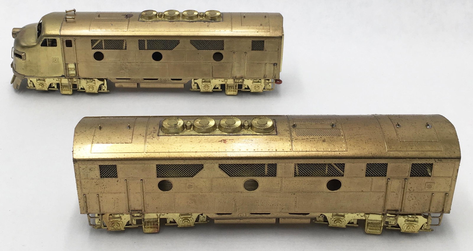 F-3 A & B HO Train Engine by Hallmark Models.: Made in the USA, With Original Box. Unpainted, It may have Been Used Very Little, if at all. Untested. Engine Itself Measures 7" Long. The Tender Measures 6 3/4" Long. The Box is Splitting Apart at th