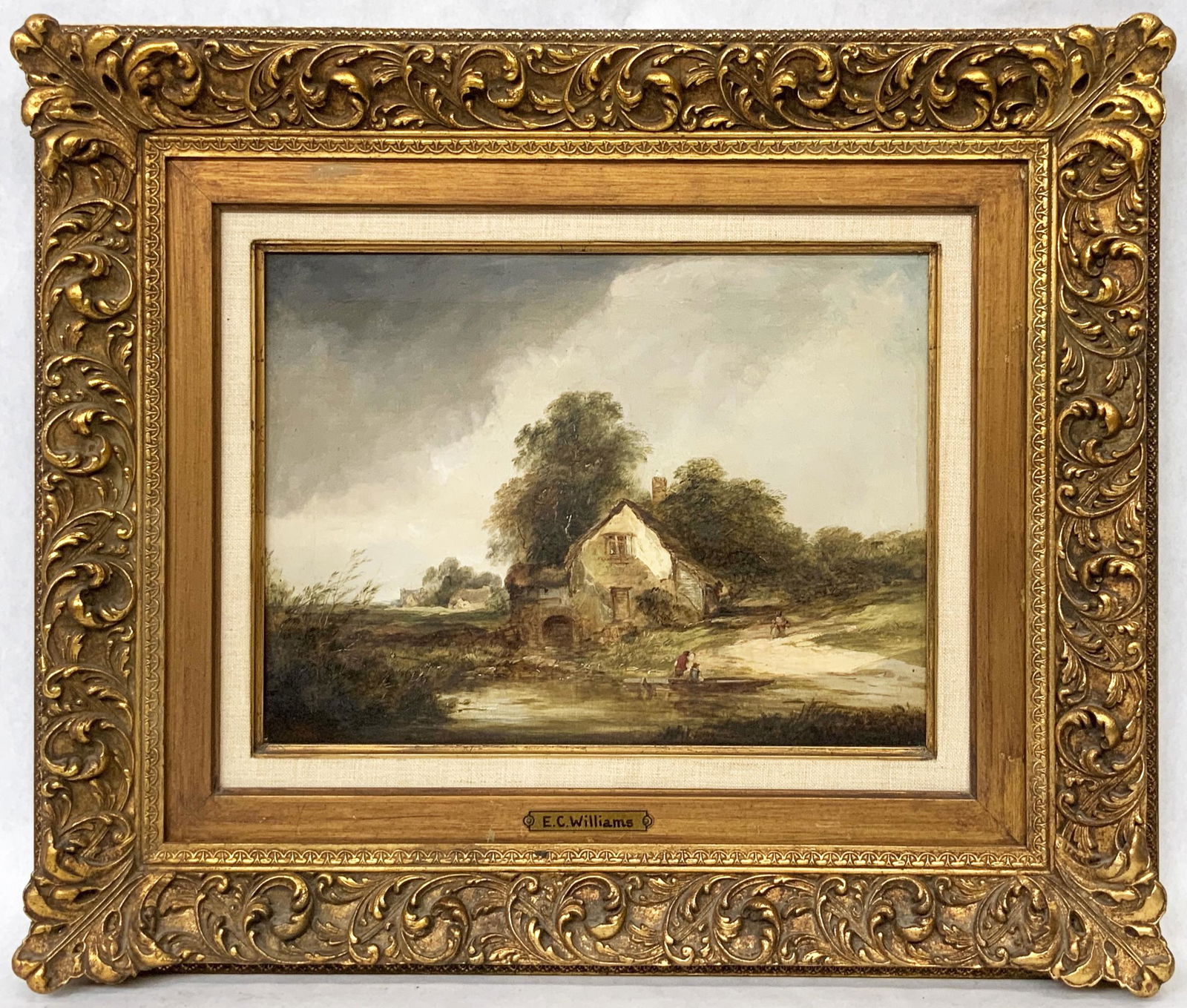 Unsigned Edward Charles Williams Painting.: Of a Cottage, River, Figures and Road. Oil on Canvas. The Canvas measures 12" x 16". The Frame Adds 3 3/4" to Each Side. Third-Party Shipping or Personal Pickup Required.