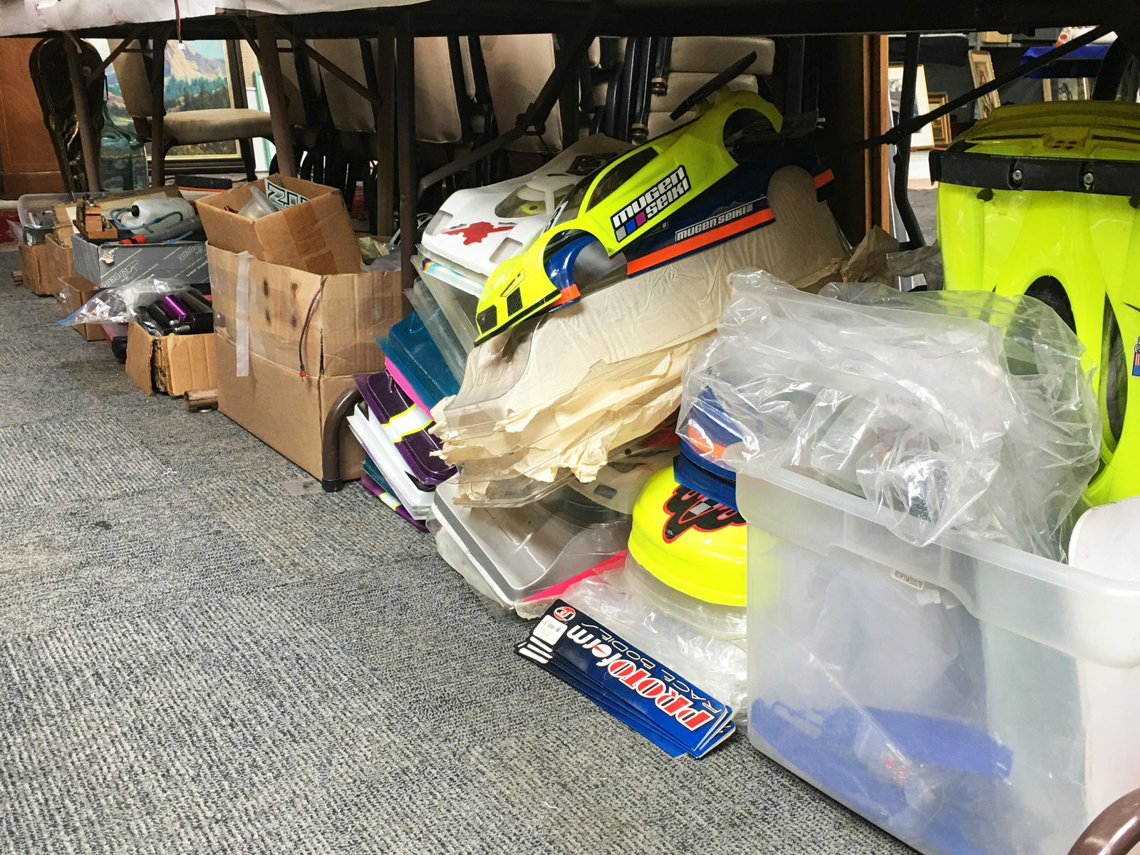 Huge Lot of Remote Control Car Parts & Accessories: All Items under the Table, and the Tool Chest Full. Includes: Car Tops, Parts, Switches, Electronics, Wheels, etc. - Third-Party Shipping or Personal Pickup Required.