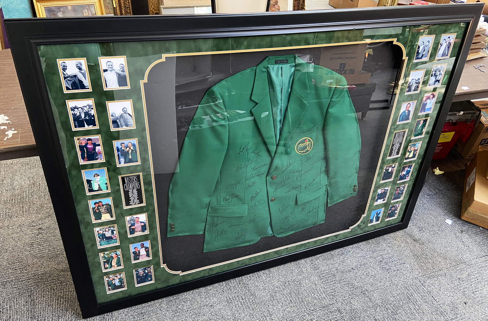 2010 Masters of Golf Autographed Green Jacket.: Comes with a Certificate of Authenticity from Bang the Gavel Auction Services. Comes with 29 Autographs of Famous Golfers, including: Tiger Woods, Jack Nicklaus, Phil Mickelson, Sandy Lyle, Jose Maria