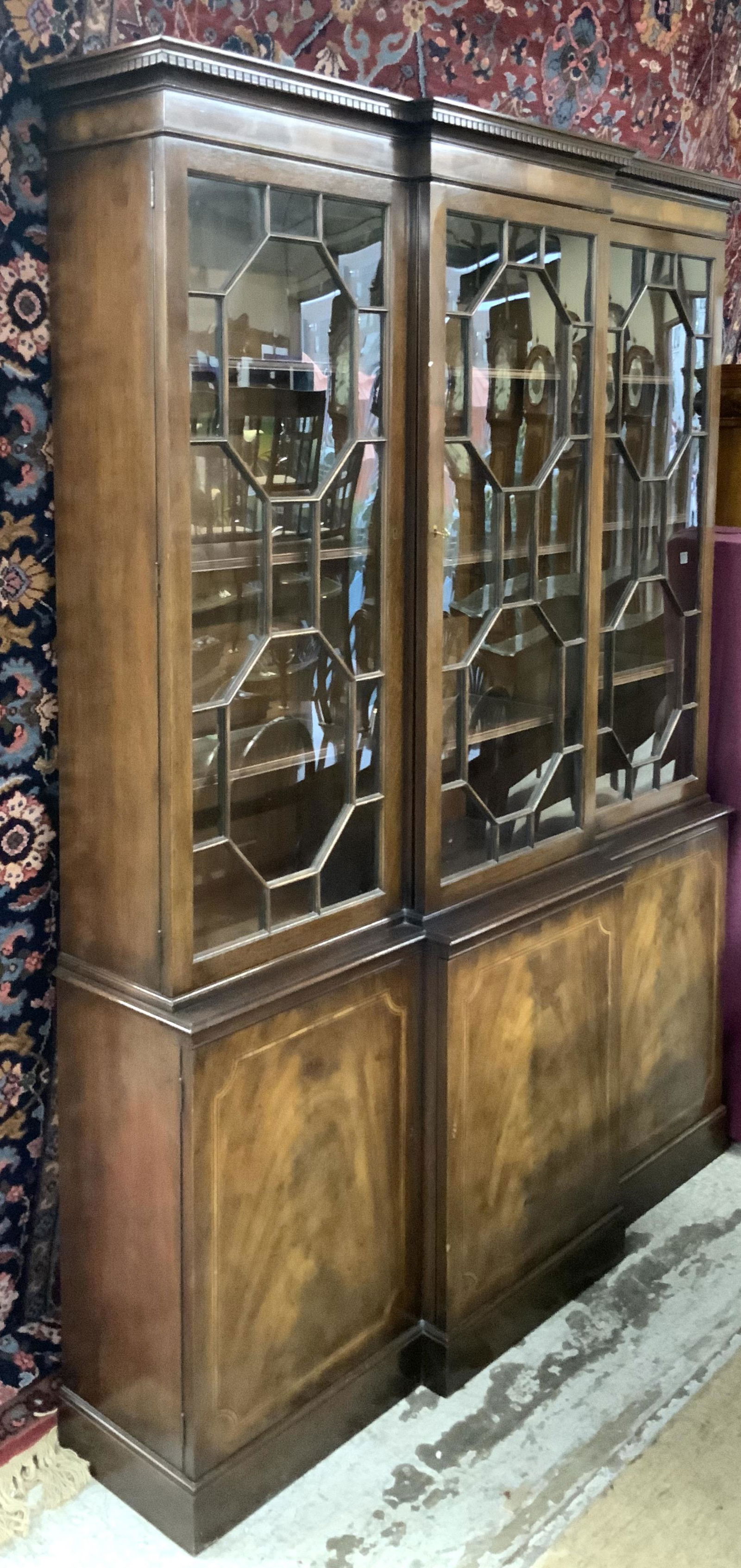 Baker Chinese Chippendale Style Breakfront.: In Good Overall Condition. Measures 58" Wide, 80" Tall, and 12 1/4" Deep. In Very Good Overall Condition. Third-Party Freight Shipping or Personal Pickup Required.