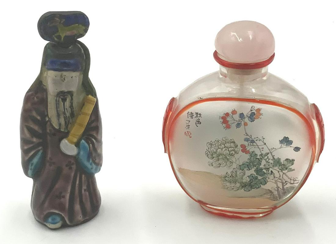 Lot of 2 Chinese Snuff Bottles.: An Older Figural Snuff Bottle of a Chinese Man (3 3/8" Tall), and a Reverse-Painted Snuff Bottle (3 1/8" Tall).