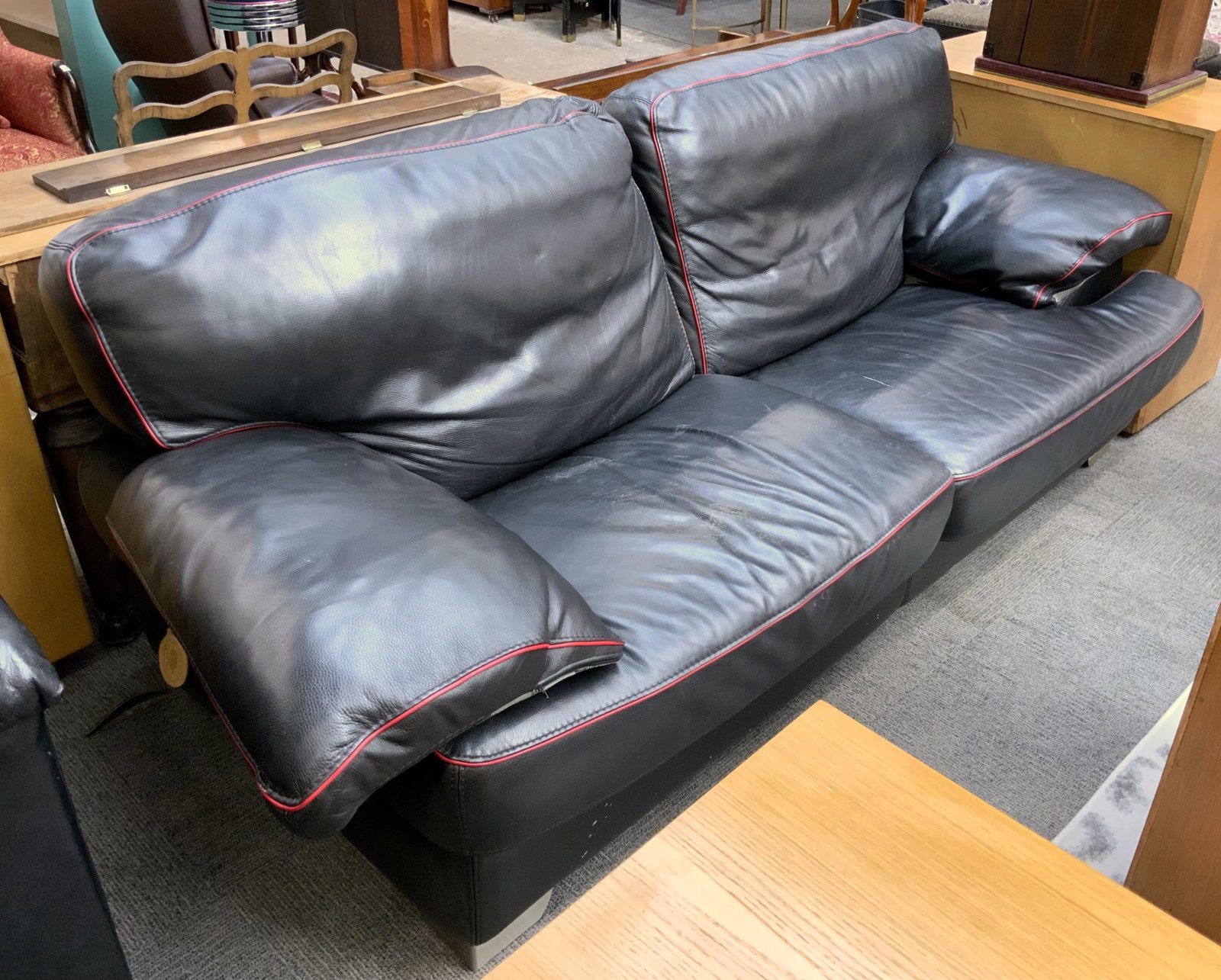Gamma Arredamenti Black Leather Sofa.: With Small Metal Feet. The Sofa has some Wear on the Seats. Measures 86" Wide, 36" High, and 36" Deep. Third-Party Freight Shipping or Personal Pickup Required.