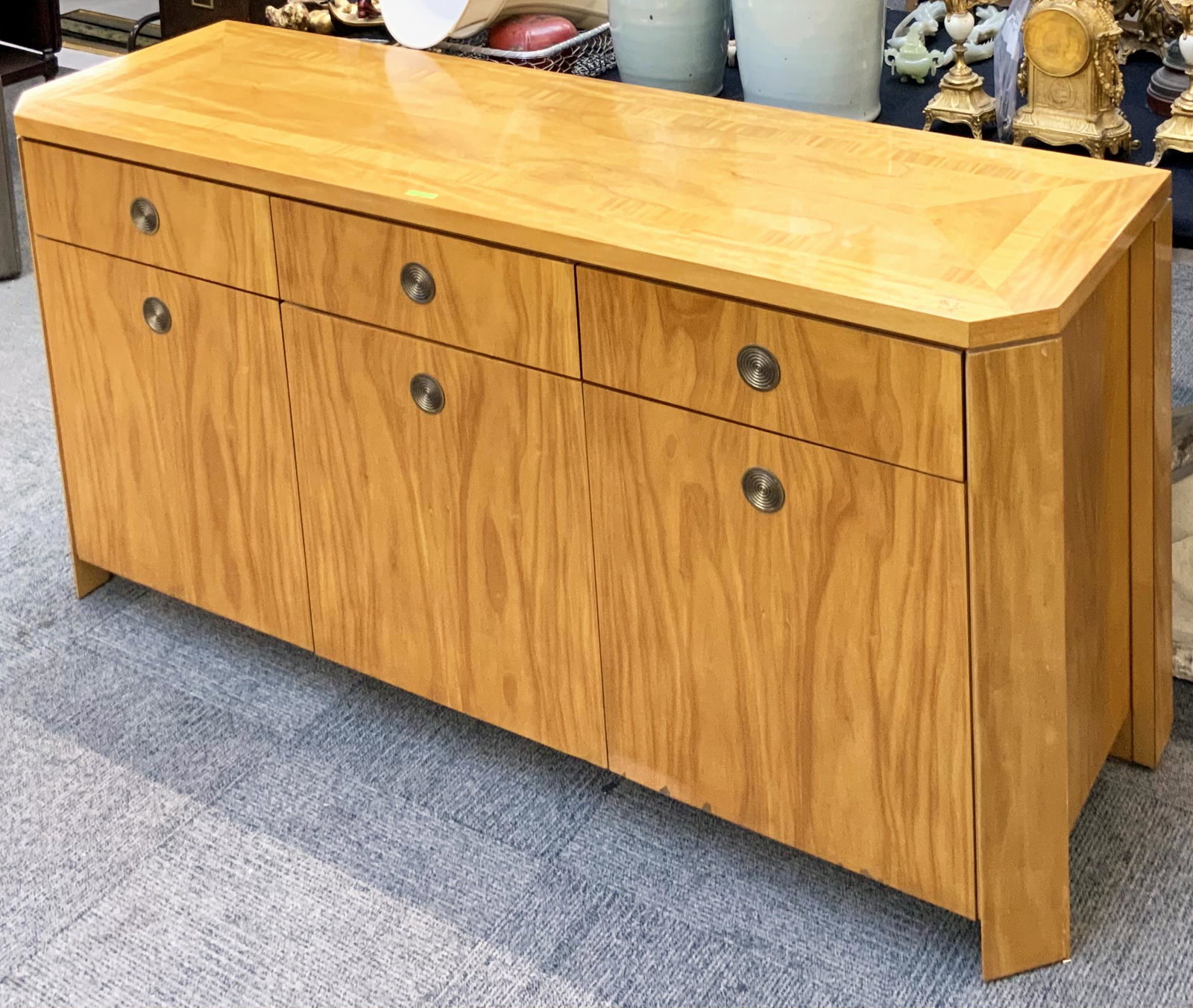 Blonde Baker Buffet / Sideboard / Credenza.: In Good Overall Condition. Has a bit of Wear on Each of the Front Legs. Measures 66 1/2" Wide, 32 1/4" High, and 19" Deep. Third-Party Freight Shipping or Personal Pickup Required.