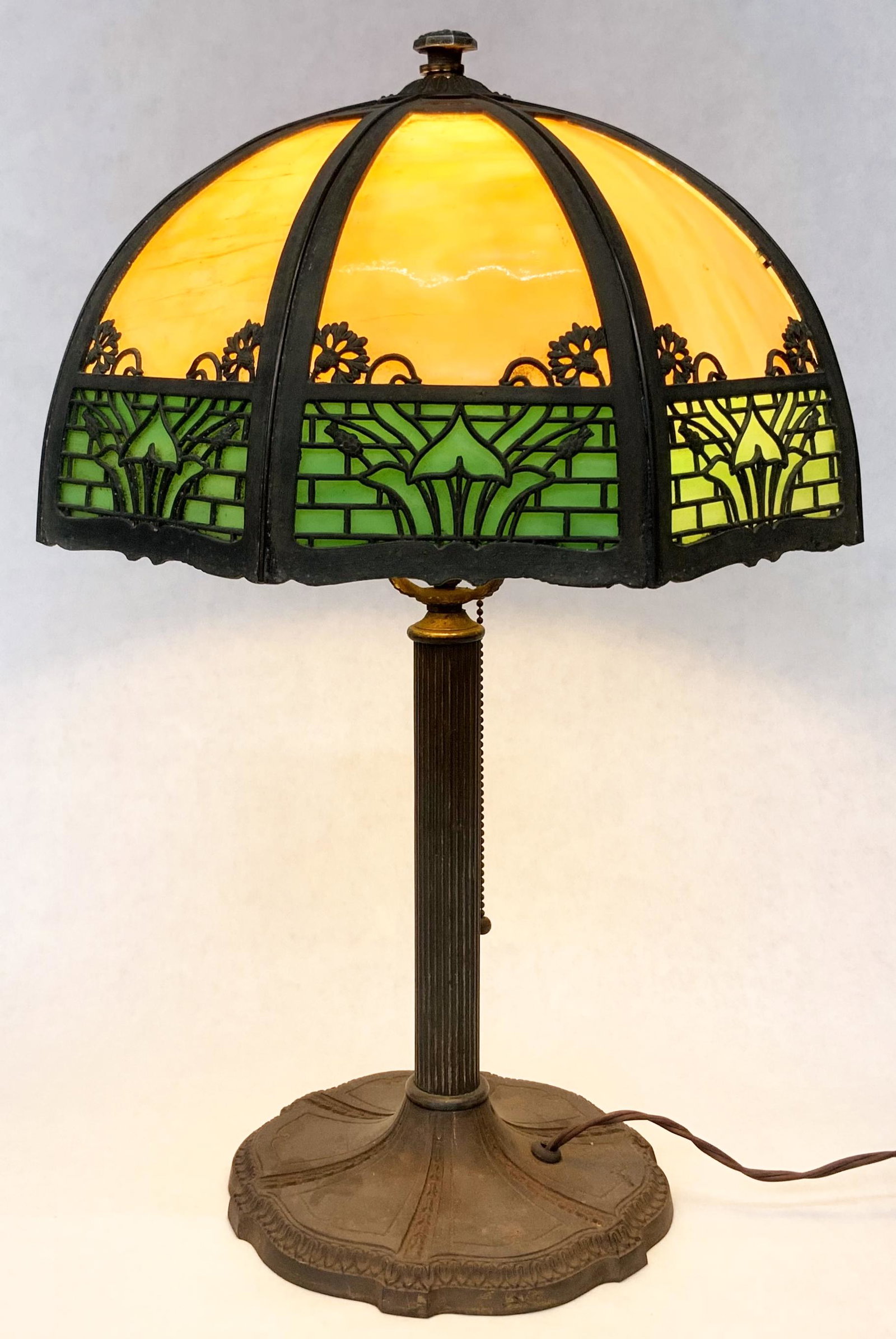 Antique Two-Tone Slag Glass Panel Lamp.: Measures 21" Tall. The Shade Measures 13" in Diameter. The Metal is a bit Dirty and Crusty, but the Lamp is in Overall Good Shape, with all Panels intact. Third-Party Shipping or Personal Pickup Requi