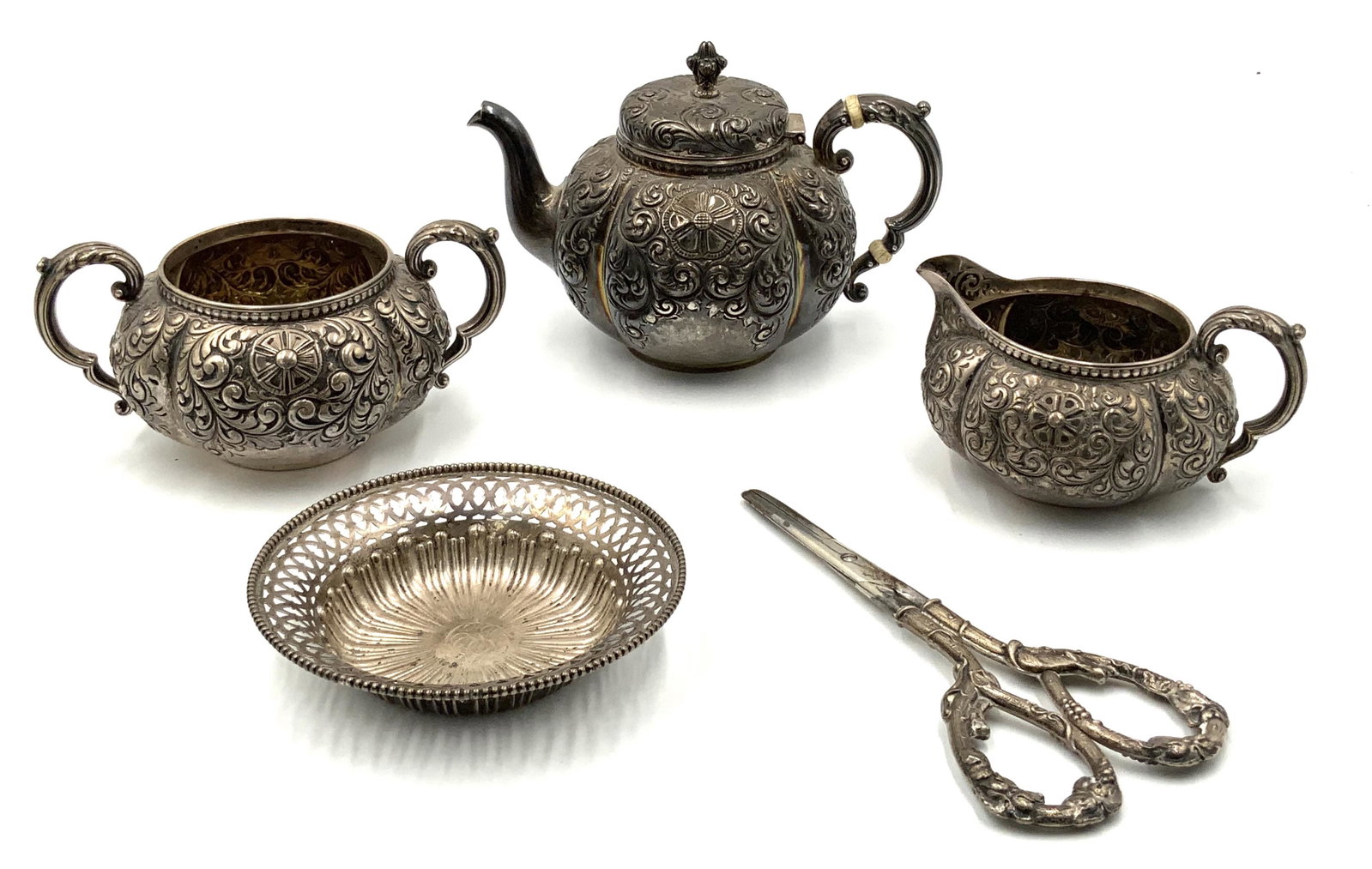 Lot: 5 Sterling Silver Antique Items.: A 3 Piece Ornate Gorham Demitasse Pot, Sugar & Creamer Set, a Small Reticulated Dish (4 1/2" Diameter), and a Pair of Sterling Handle Scissors (6 1/2" Long). The Tiny Teapot Measures 4 7/16" Tall and 