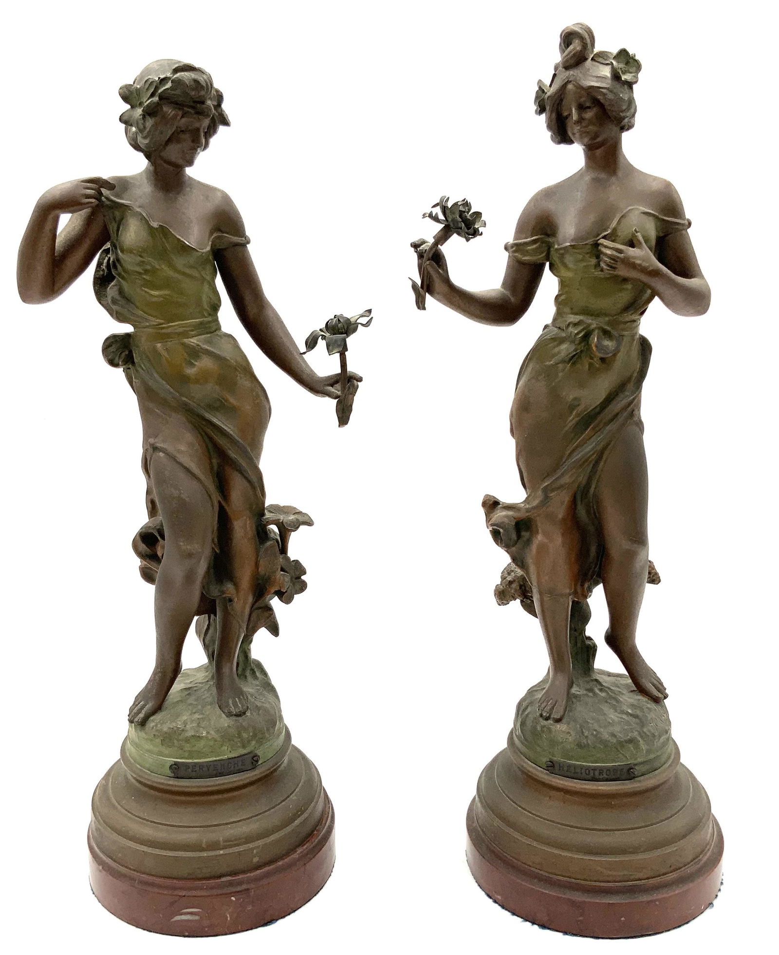 Pair of White Metal Art Nouveau Lady Figures.: "Pervenche" and "Heliotrope", sgd. J. Causse. These Measure 17 1/8" and 17 5/8" Tall. Third-Party Shipping or Personal Pickup Required.