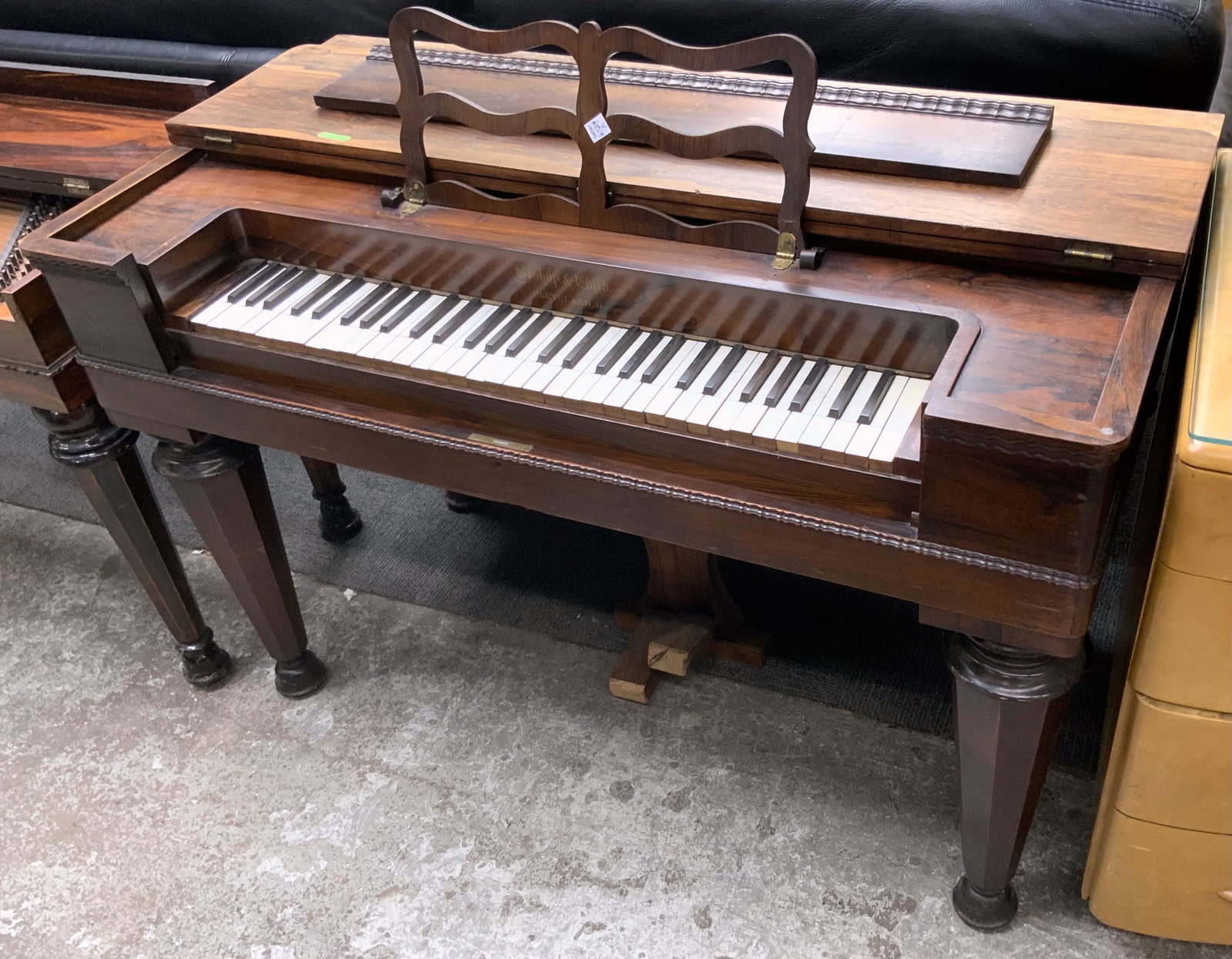 Rosewood Pump Organ.: Measures 48" Wide. Working Condition is not Known. Third-Party Freight Shipping or Personal Pickup Required.