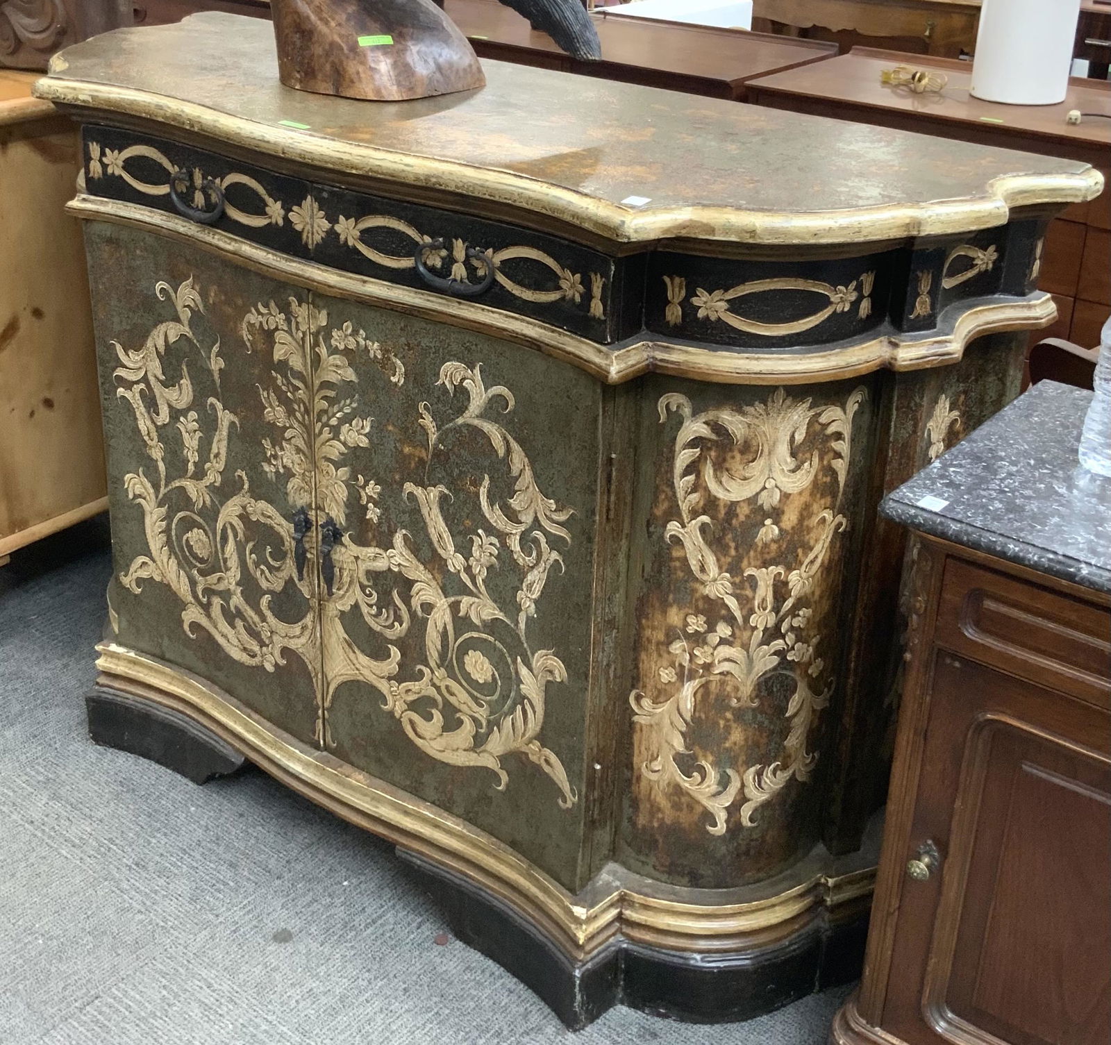 Curved Front Floral Decorated Buffet / Cabinet.: With an Inside Shelf. Has some Light Wear. Measures 59" Wide, 41" Tall, and 21" Deep. Third-Party Freight Shipping or Personal Pickup Required.
