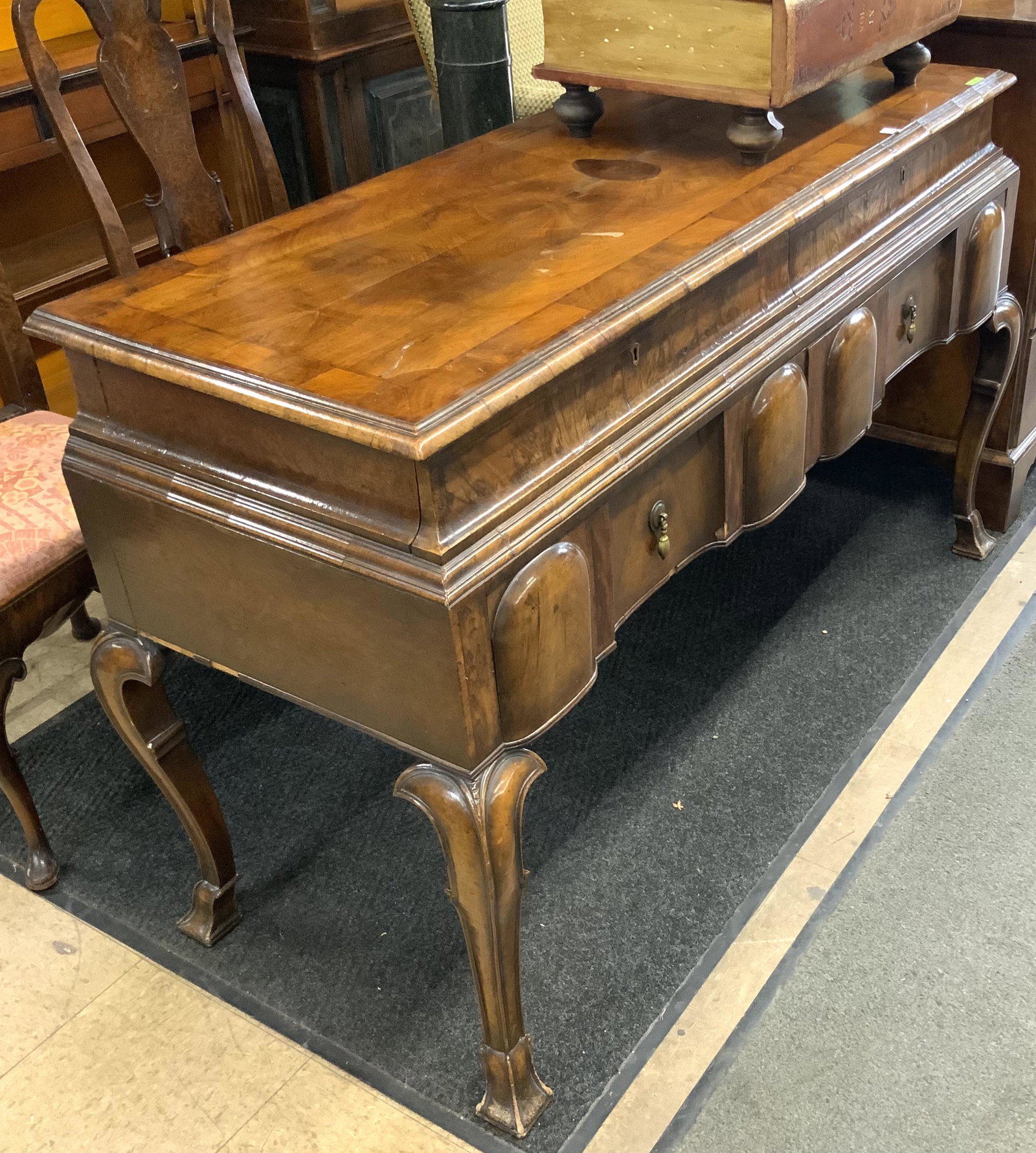 Antique Walnut Sideboard with Inlaid Top.: And Teardrop Pulls. A Few Pieces of the Side Trim is Missing. Measures 55 1/2" Wide, 34 1/2" Tall, and 21" Deep. Third-Party Freight Shipping or Personal Pickup Required.