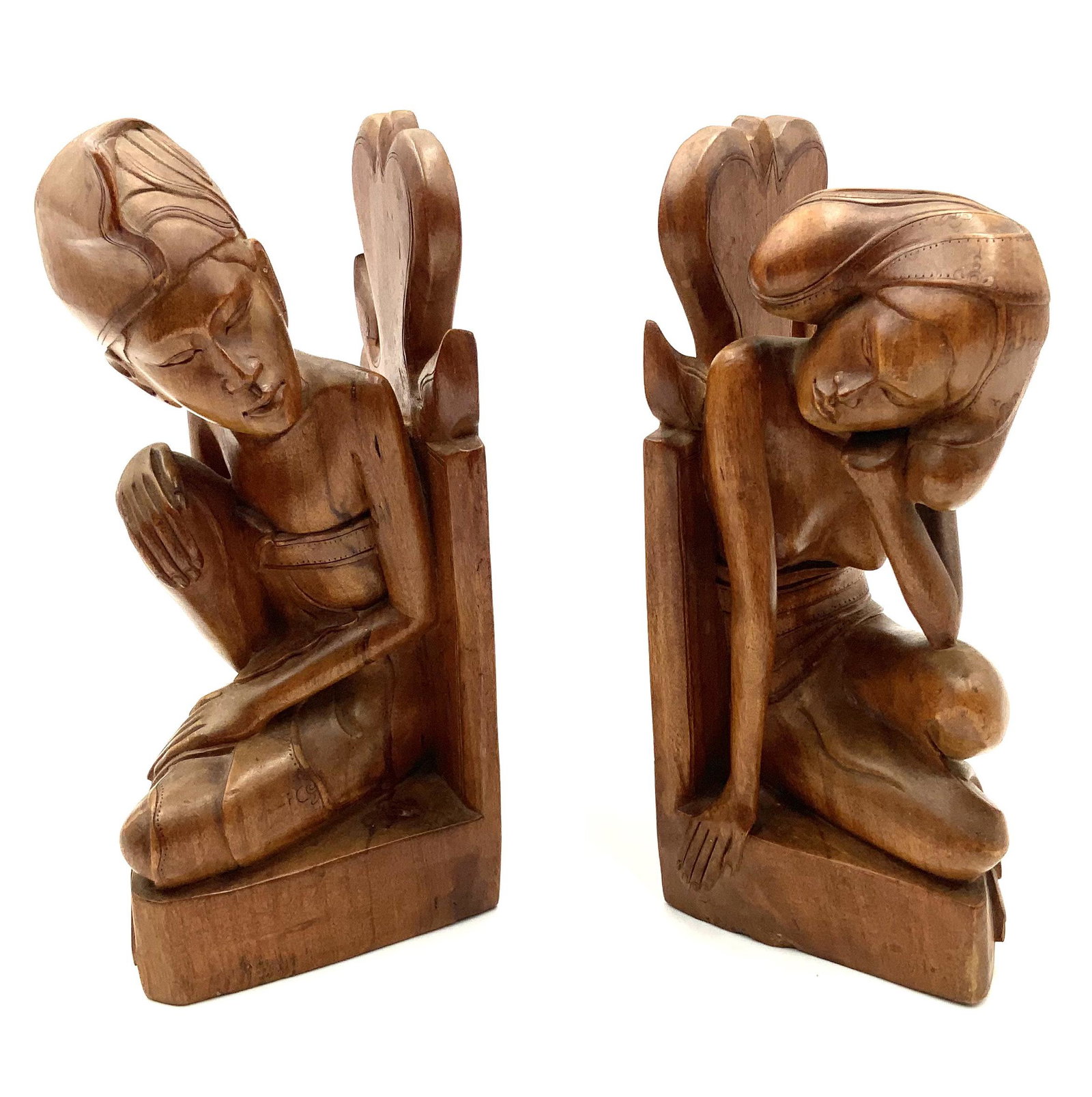 Set of Carved Wood Man and Woman Figural Bookends.: About 9" tall, in nice condition. Some faint cracks, not very noticeable. These look to be Southeast Asian.
