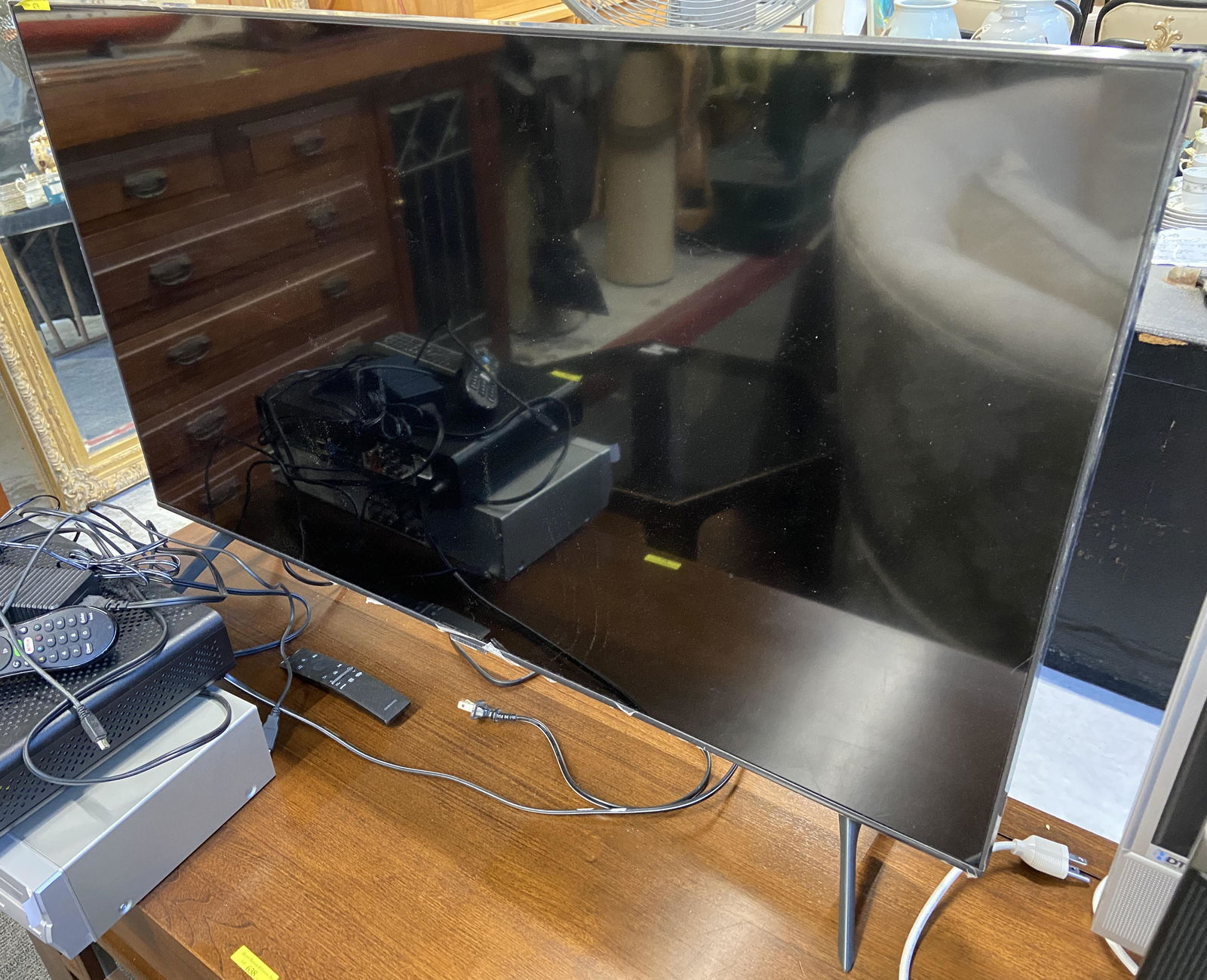 Year 2020 43" Flat Screen Samsung TV.: Model # QN43Q60TAF. Manufactured September of 2020. With Remote. Third-Party Shipping or Personal Pickup Required.