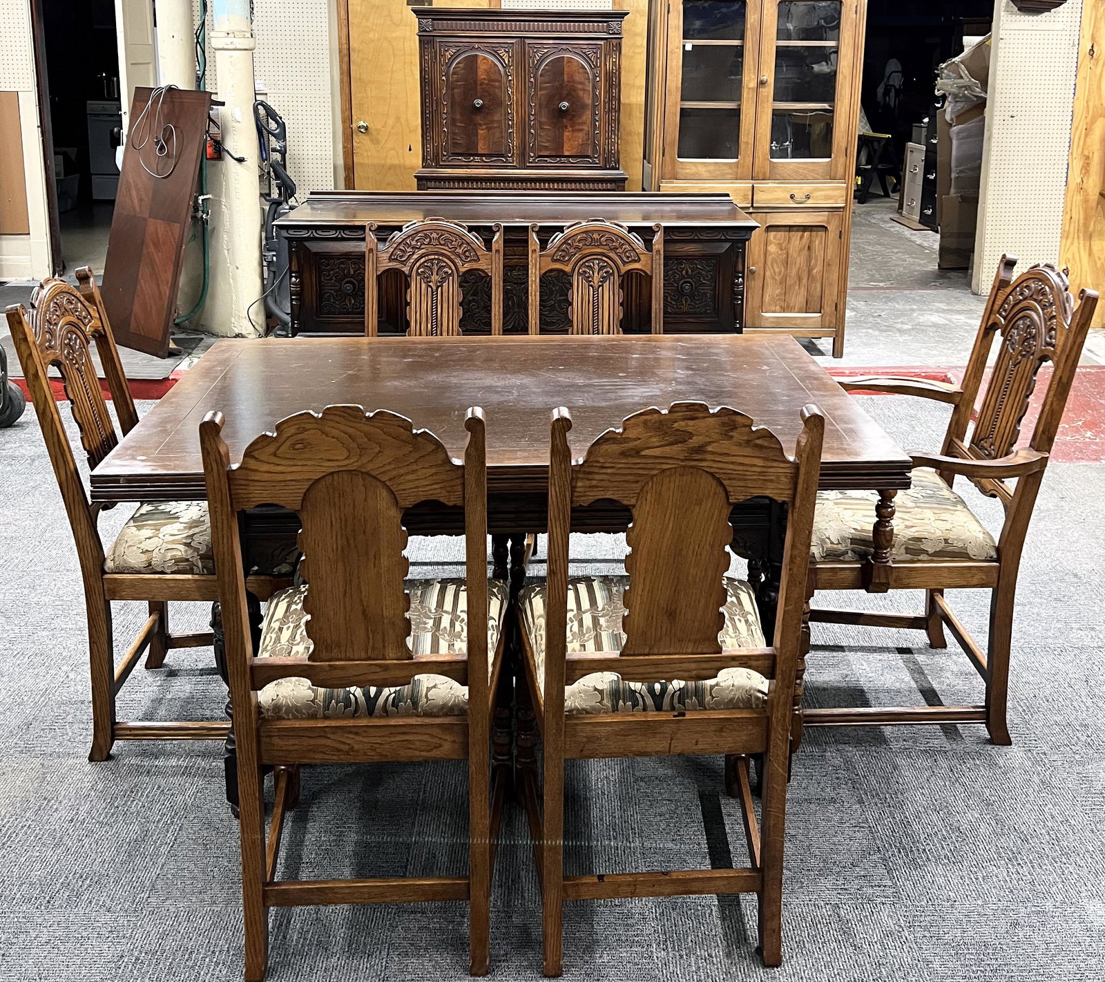 Antique Carved Oak Refectory Dining Room Set.: Consists of a China Cabinet, Sideboard, Refectory Dining Table and 6 Dining Chairs. Third-Party Freight Shipping or Personal Pickup Required.