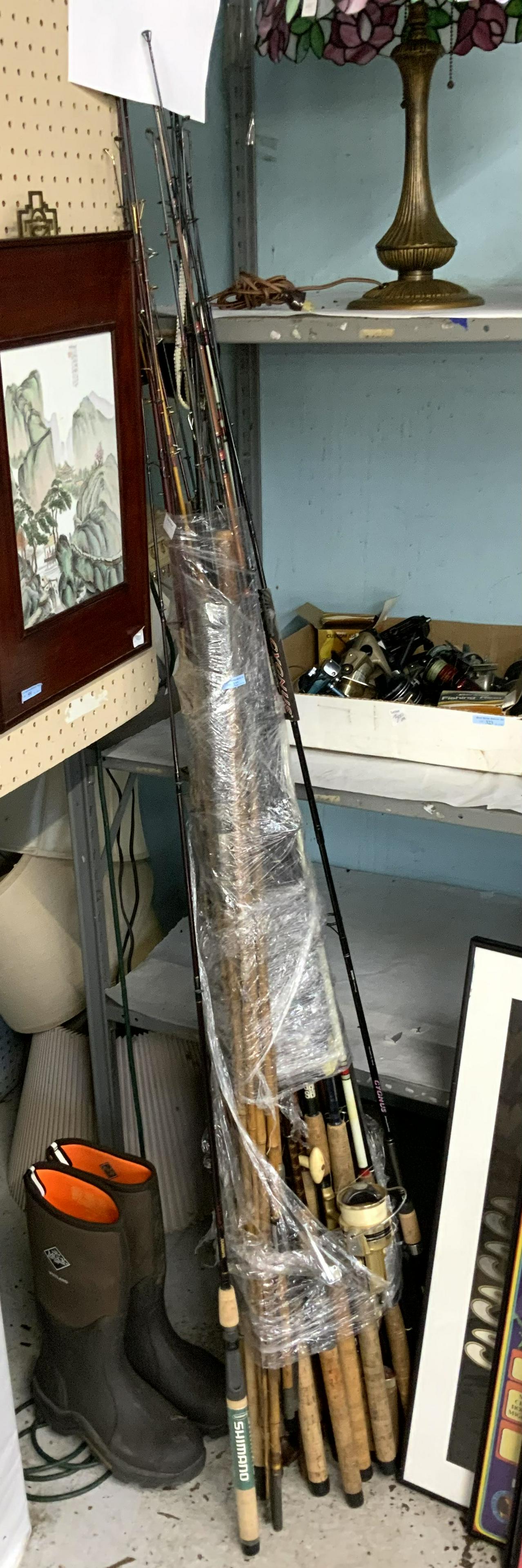 Large Lot of Fishing Rods & Pair of Boots.: More than 25 rods Fair to Very good condition. Three of the Rods have Reels on them. One is a Daiwa GS-6, one is a Daiwa Cygnus, and one is a True Temper 922C. Westland Muck Boots good cond. Third-Par