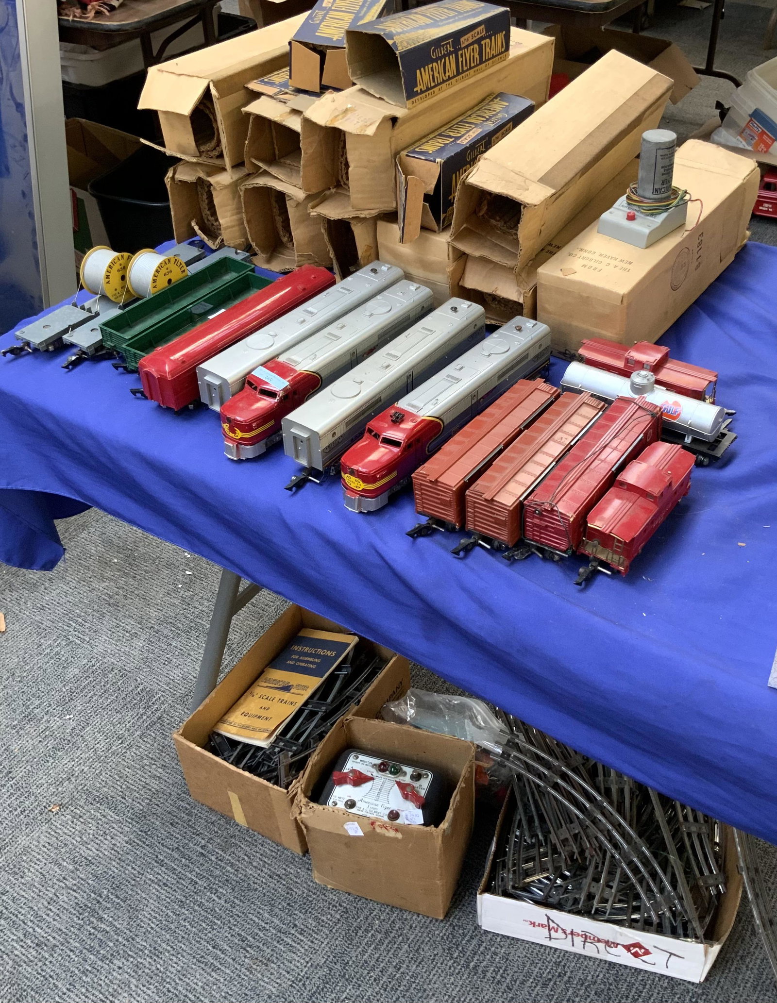 Lot of American Flyer Trains, Track & Transformer.: Some with Original Boxes. Includes: Two Santa Fe Engines #360, Two Santa Fe Cars #364, Two Bale Carriers #636, Two #631 Coal Cars, Two #734 Box Cars, #718 Red Car (Missing a Door), Two #630 Cabooses, 