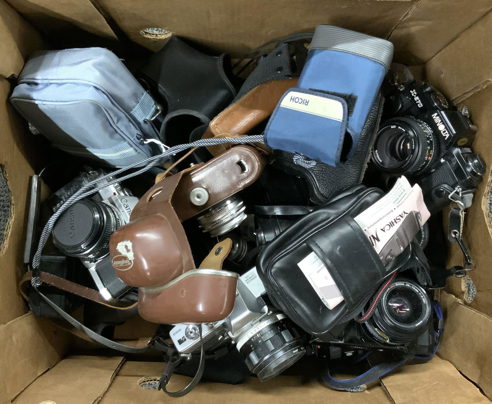 Lot of Appx. 12 Cameras.: Includes: Minolta, Voigtlander, Yashica, and Canon. Third-Party Shipping or Personal Pickup Required.