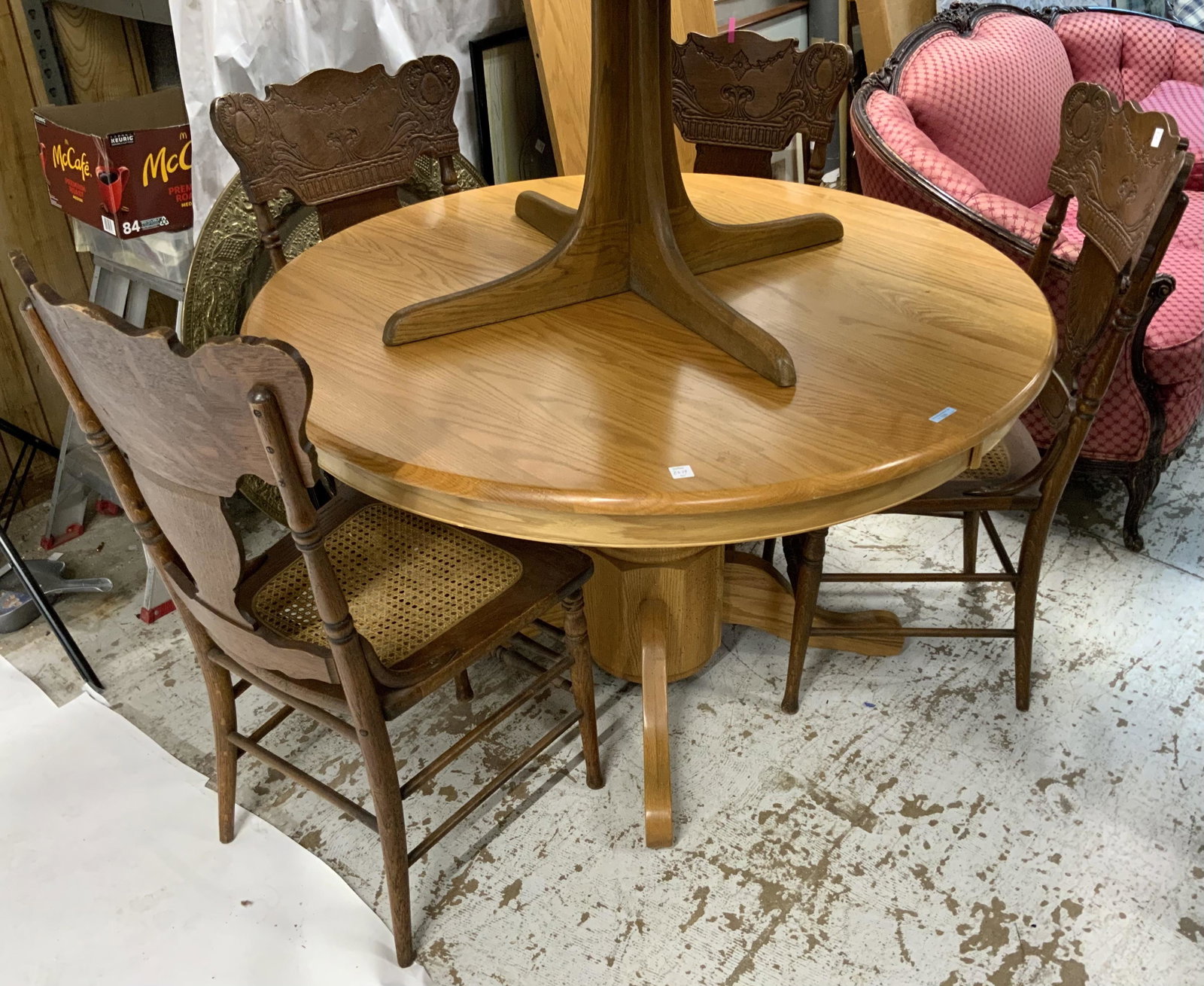 Lot: 48" Round Pedestal Table & 4 Chairs.: The Chairs have Pressed Backs. Third-Party Freight Shipping or Personal Pickup Required.
