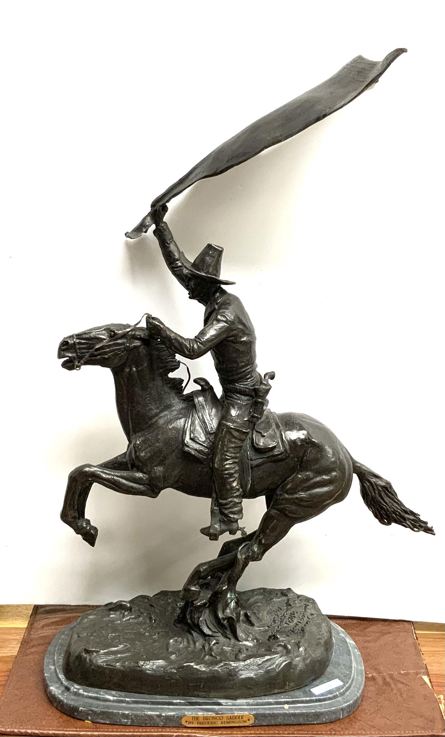 Frederic Remington Reproduction Bronze.: Titled "The Bronco Saddle". Measures 32" Tall, 19" Wide, and 9" Deep. It's Heavy. Third-Party Shipping or Personal Pickup Required.