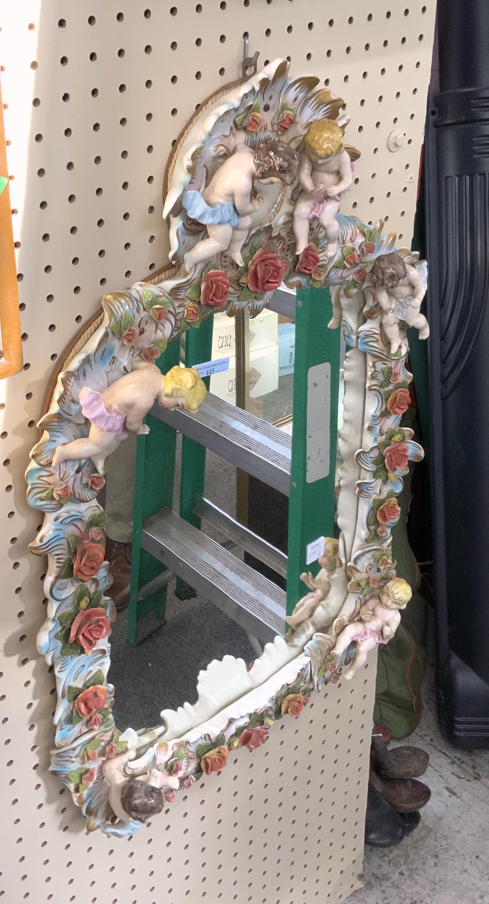 Ornate Capodimonte Porcelain Mirror w/Cherubs.: Has a Tiny Chip on one of the Flowers on the Bottom. Measures 20" Wide and 29 1/2" Tall. Third-Party Shipping or Personal Pickup Required.