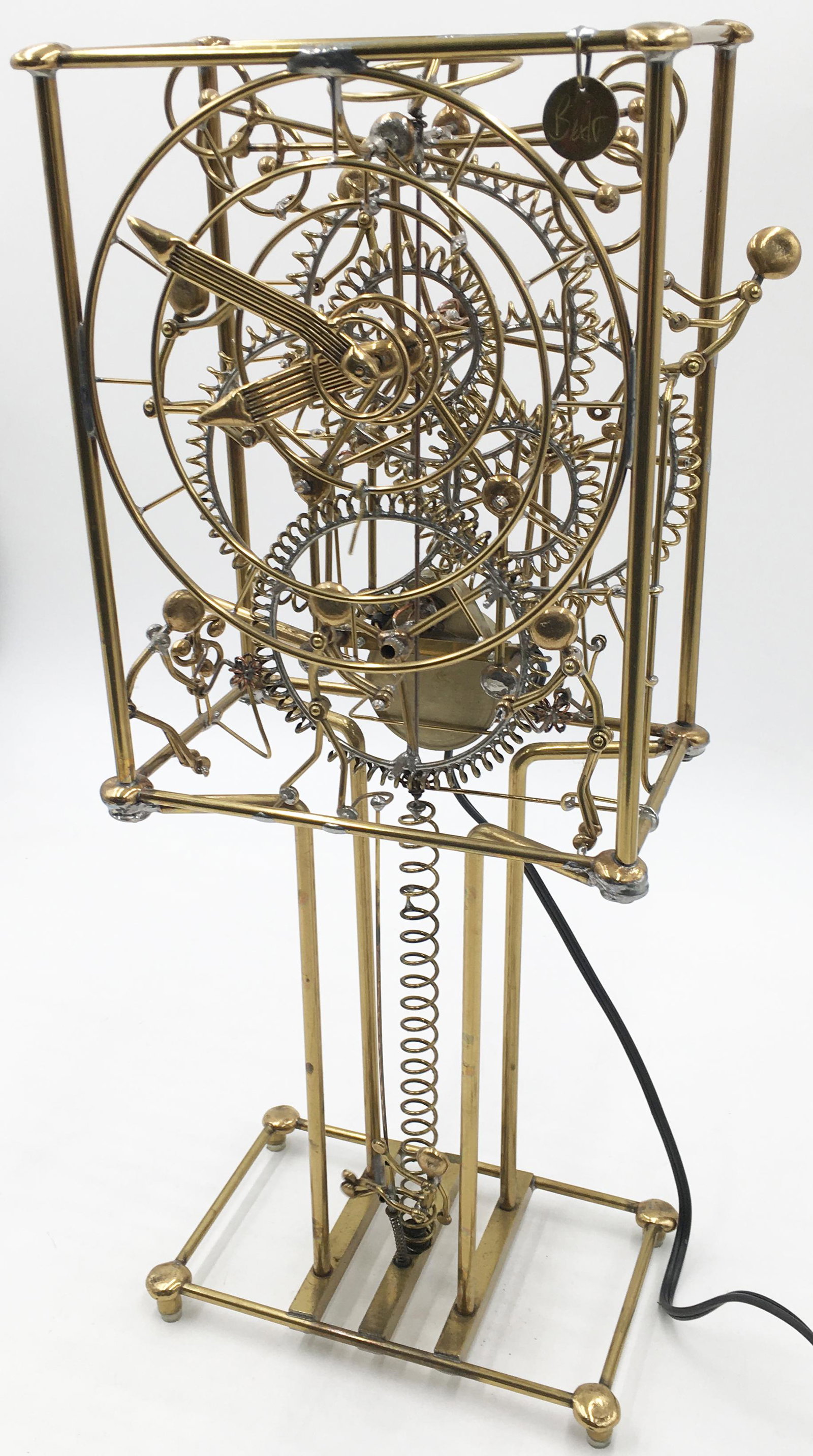 Gordon Brandt 7-Man Clock Made by Kinetico.: 1970's to 1980's. Works Great! Measures 17 3/8" Tall, 7" Wide, and 4 1/2" Deep. Third-Party Shipping or Personal Pickup Required.