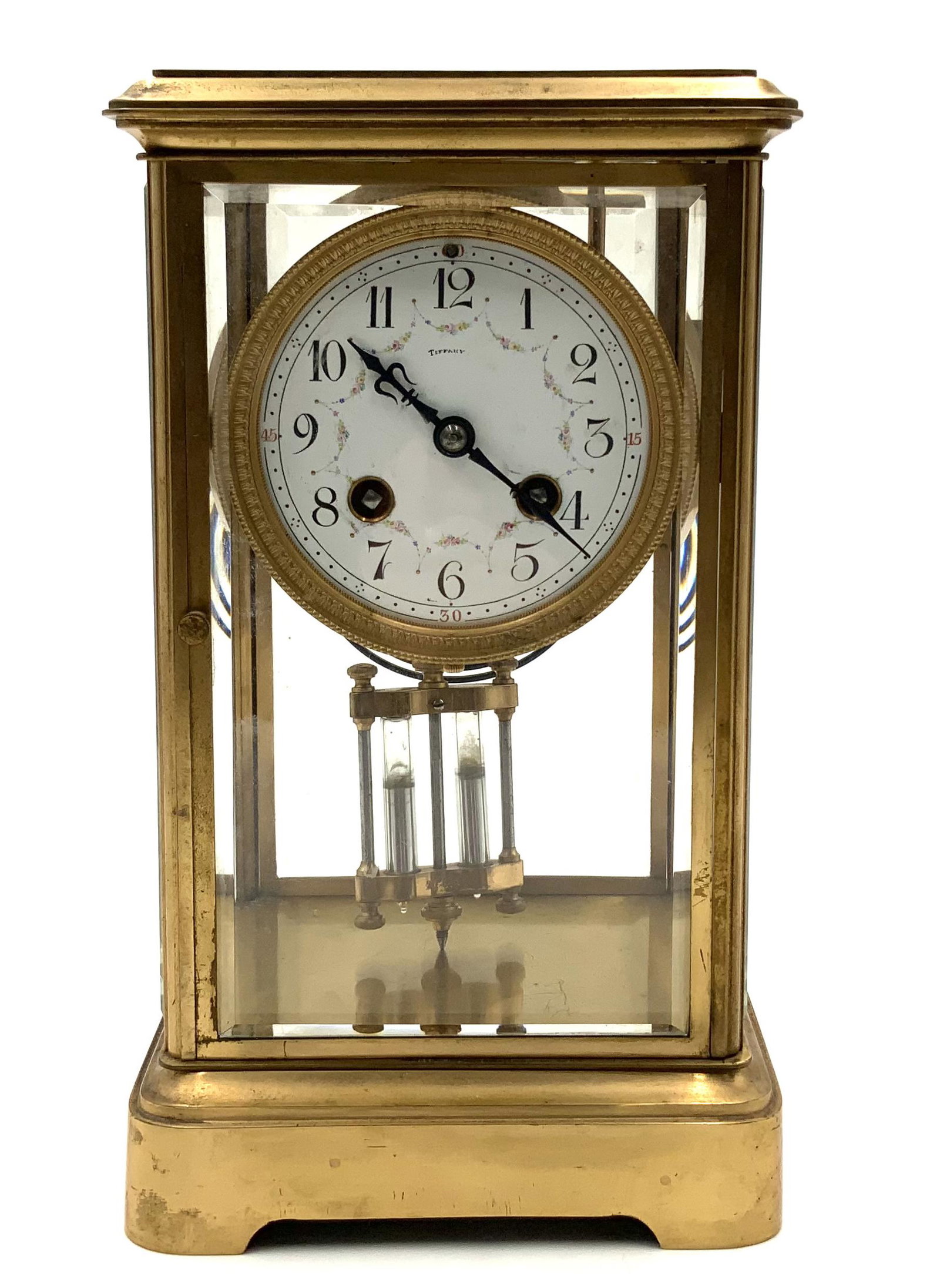 Crystal Pendulum Carriage Clock, Marked Tiffany.: Working condition unknown. Measures 10" tall, 6" x 5" at base. Some scuffs and scratches on the brass. Third-Party Shipping or Personal Pickup Required.