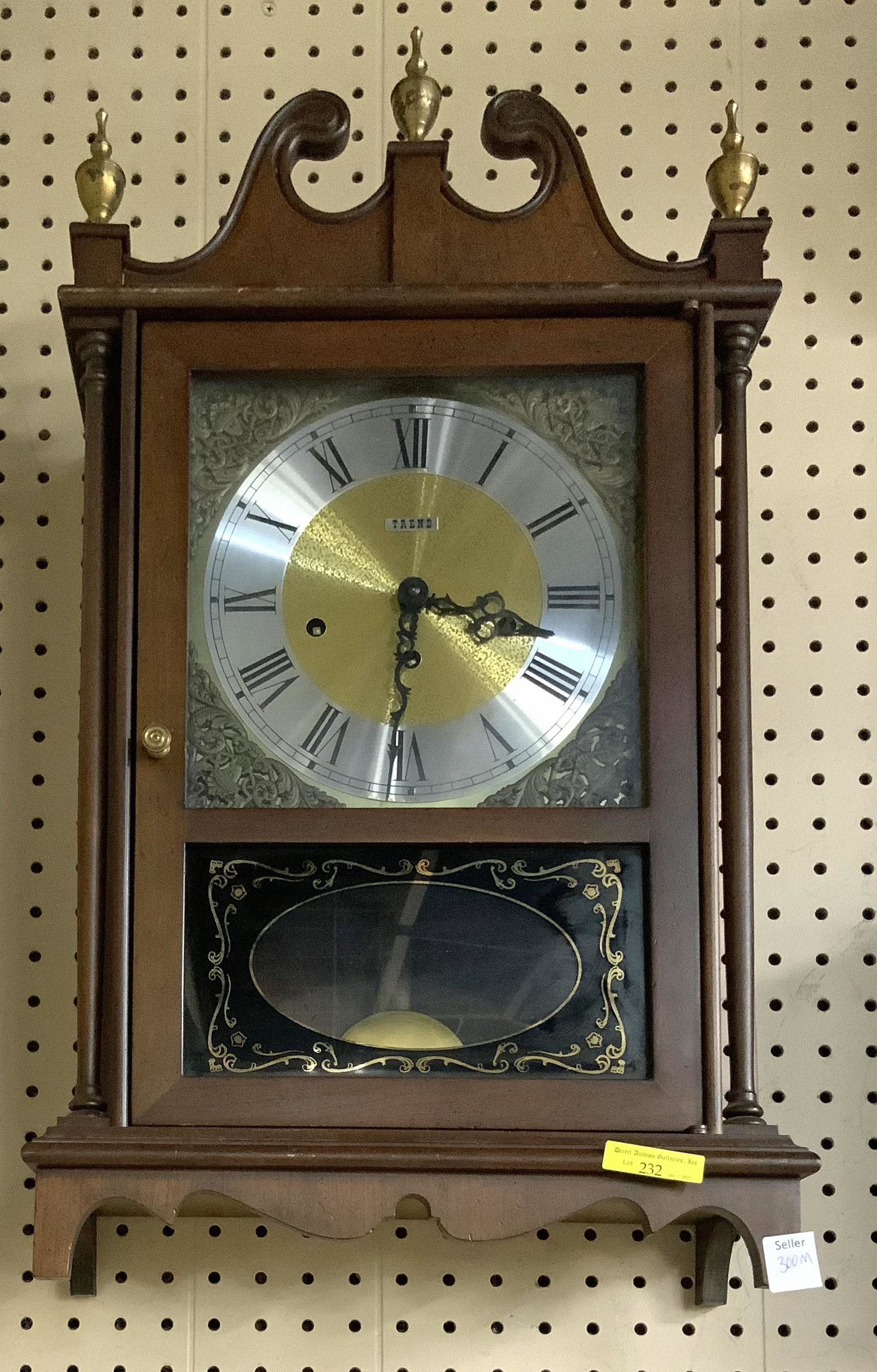 Vintage Wood Wall Clock by Trend.: Working condition unknown. Measures 25" tall, 14" x 5.5" at base. There are a few scuffs and scratches. Third-Party Shipping or Personal Pickup Required.