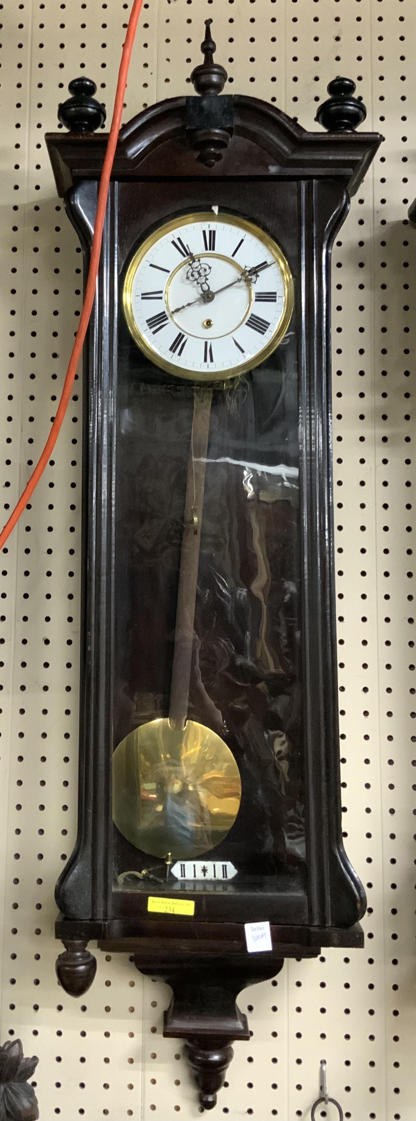 44" Tall Regulator Wall Clock.: Working condition unknown. Missing a knob on the bottom. Some scuffs and scratches. Third-Party Shipping or Personal Pickup Required.