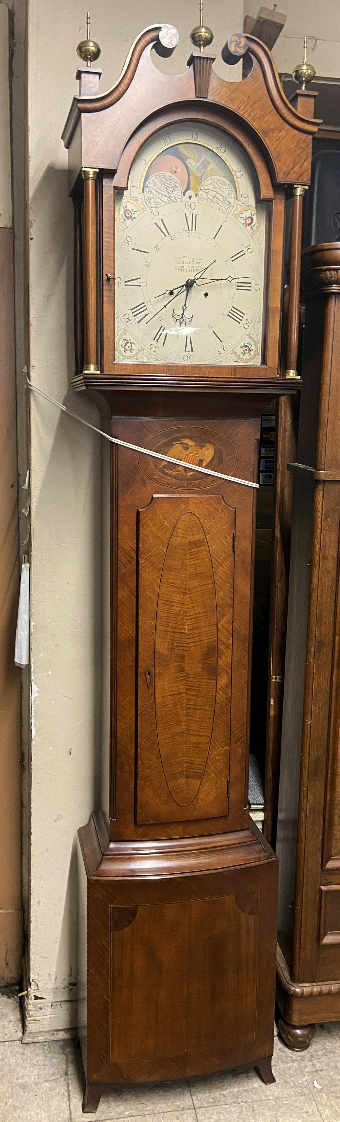 Limited Edition Jacob Eby Grandfather Clock.: Numbered 131 of 300. With a Special Brass Nameplate Inside the Door, and a Wood-Burned Seal from the Henry Ford Museum. The Clock Face is Hand-Painted. The Clock Measures 18 3/4" Wide, 99 3/4" Tall, a