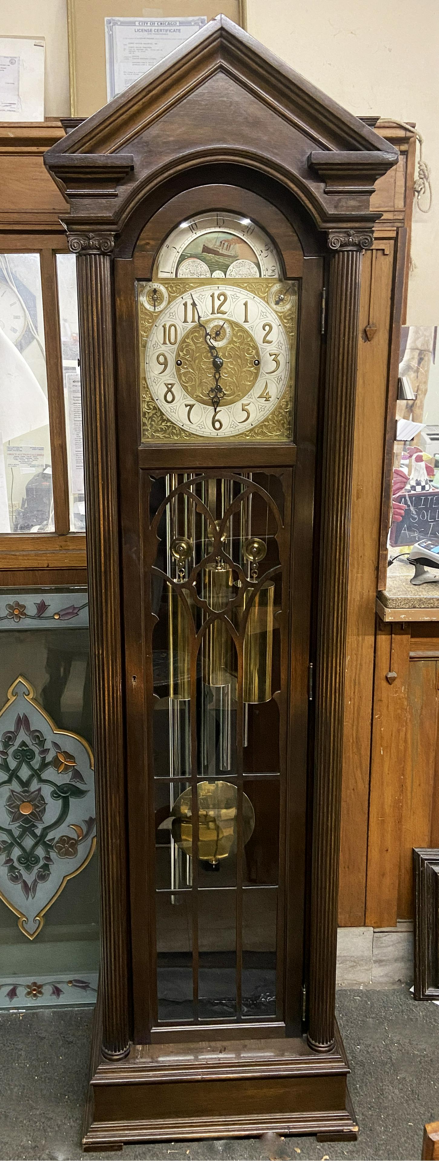 W & H. Sch. German Chiming Grandfather Clock.: With a Sailing Ship Dial & 5 Chiming Tubes. The Clock Measures 20" Wide, 86" High, and 14" Deep. Clock is in Good Overall Condition. Working Condition of the Clock is not Known. Third-Party Freight Sh