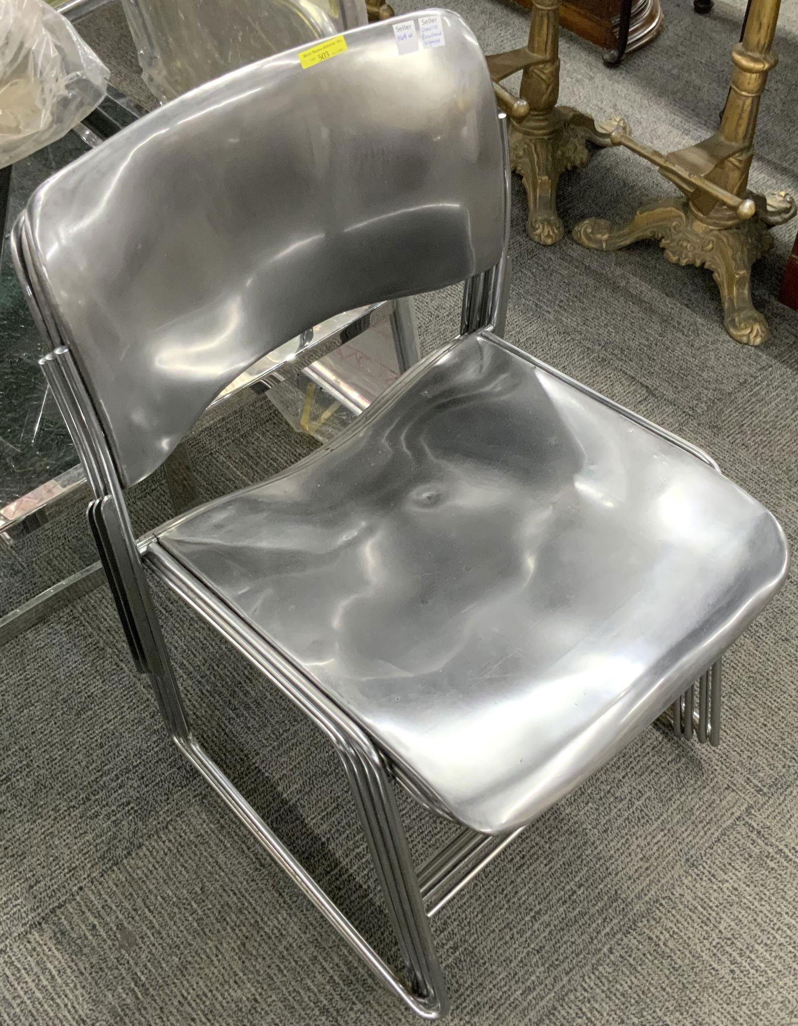 Set of 4 Signed David Rowland Stacking Chairs.: These are Metal Chairs, with a Really Nice Look. The Seats have a Few Dinks on them. They Measure 30" High and 17 3/4" Wide. Third-Party Freight Shipping or Personal Pickup Required.