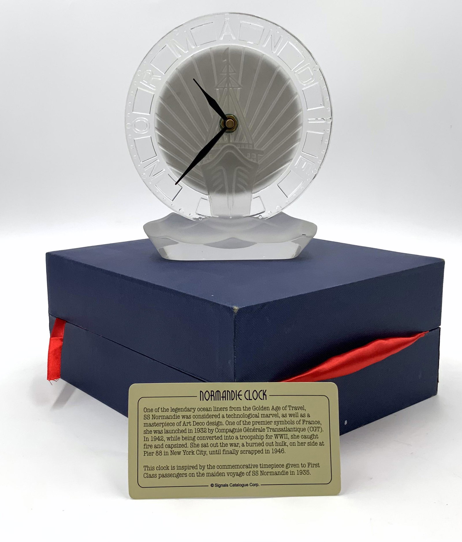 S.S. Normandie Commemorative Crystal Clock.: With Case. The Clock is Fashioned after a Clock which was Given to Passengers on the Maiden Voyage of the S.S. Normandie in 1935.