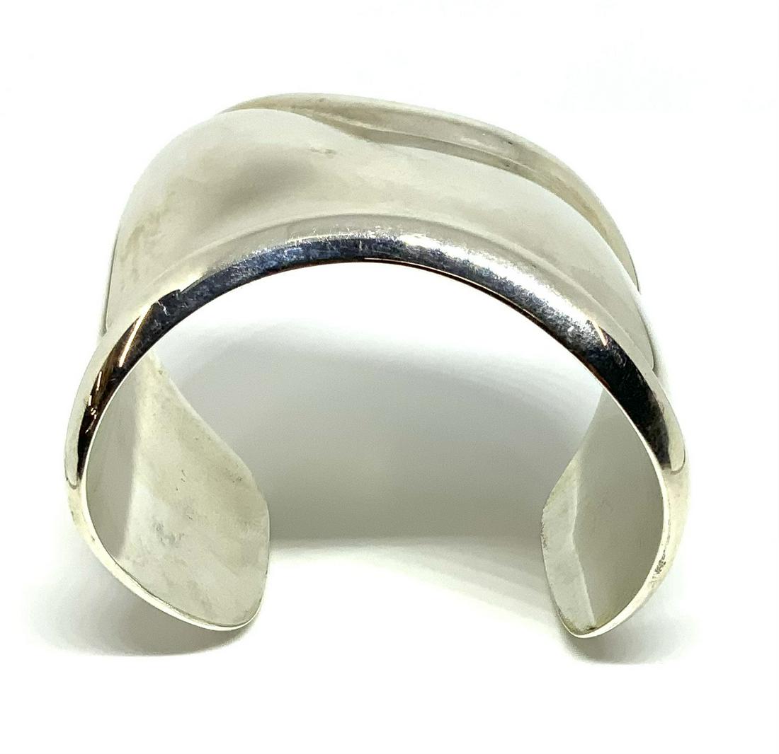 Tiffany Elsa Peretti Sterling Bone Cuff Bracelet.: Signed on the Interior. Comes with a Tiffany Blue Box, Bag, and Year 2008 Gift Receipt from Tiffany's in Oakbrook, Illinois. The Bracelet Measures 2 1/4" Wide at its Widest, Size Medium According to T