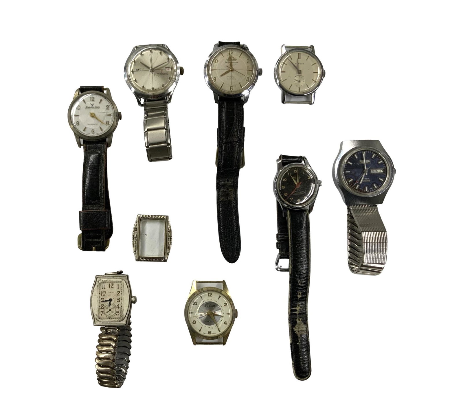 Lot of Assorted Men's Vintage Watches.: Includes a Sicura Automatic Watch (It Ticks), an Eloga 17-Jewel Watch (Not Running), an Elgin Watch (It Ticks), A Lord Nelson (Ticks when it Feels Like it), a Manhattan Electra (Not Running), a Ribu (
