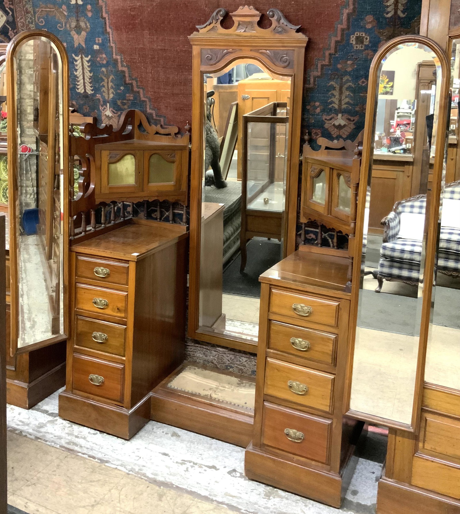 Antique Carved Vanity with Swinging Side Mirrors.: As Is - Has a Sizable Crack on the Right Hand Side (See Photo). Measures 49" Wide, 75" High, and 19 3/4" Deep. A Companion Piece to Lots 5 and 498. Third-Party Freight Shipping or Personal Pickup Requ