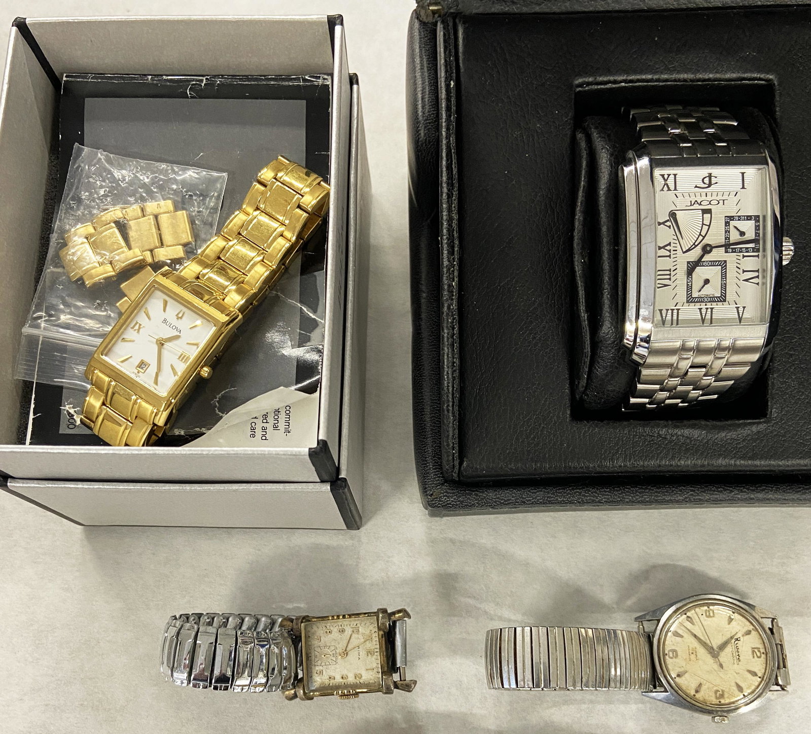 Lot of Assorted Watches, all Ticking.: Includes a Triple-Dial Jacot Automatic Watch with the Case, A Bulova Watch with the Case, a Vintage Bulova Accutron Watch, and Two Vintage Windup Watches - Rima and Rivera Automatic (Both are not so F